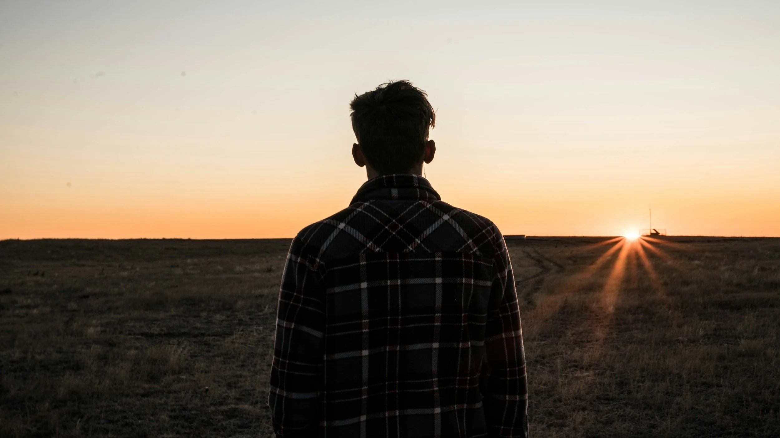 Man watching sunrise