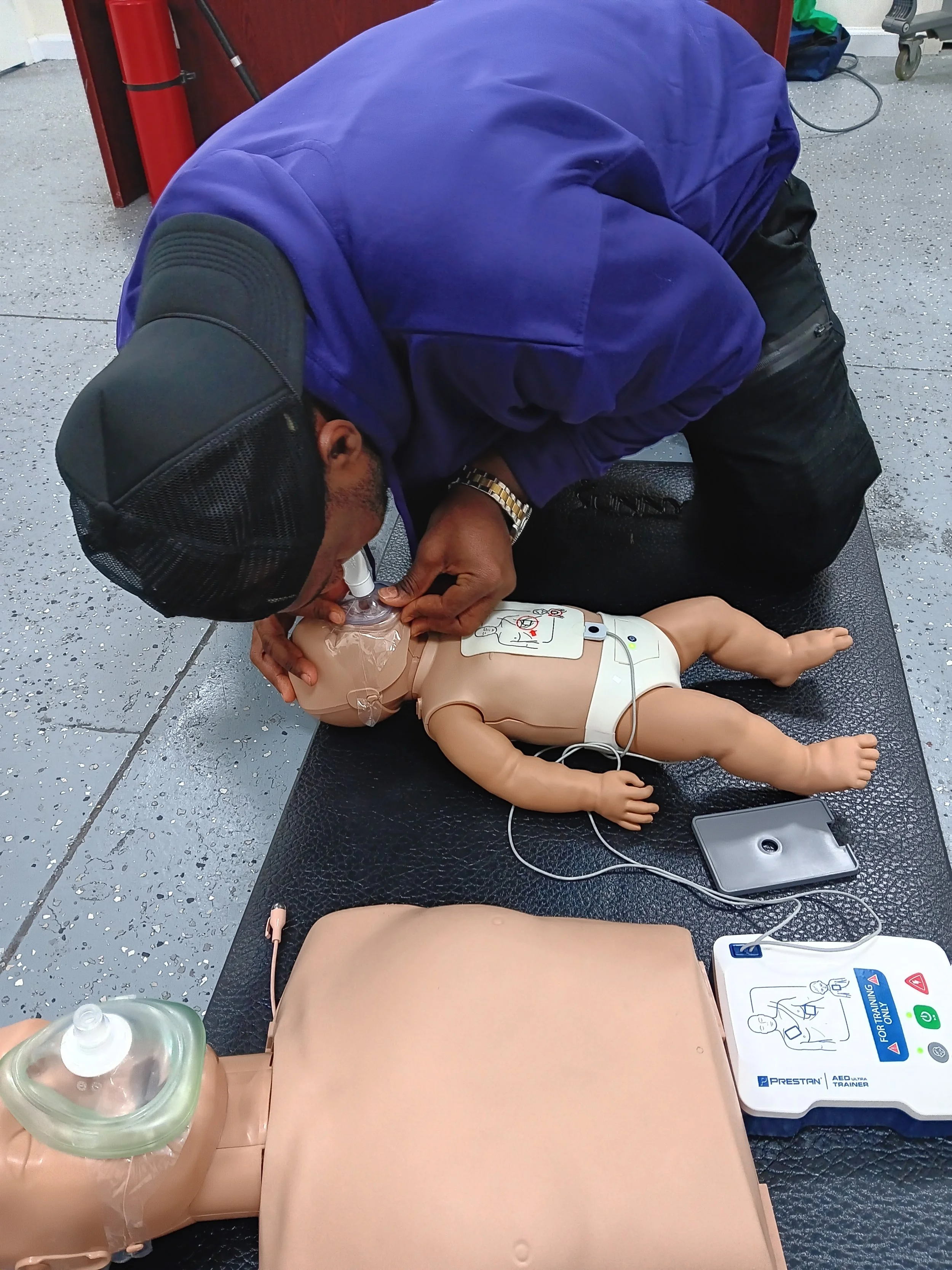 Adult and Infant AED Usage, On Floor w-Mat.jpg