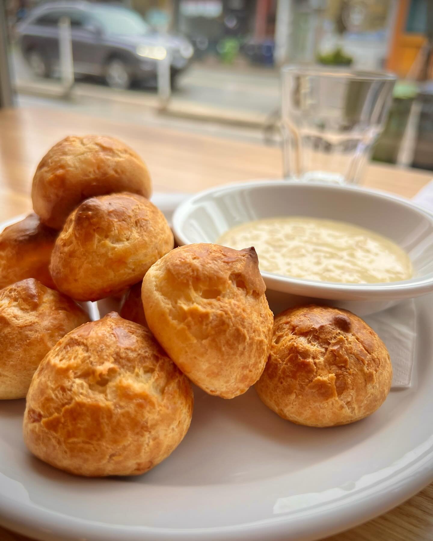 Goug&egrave;re with mustard cheese sauce.