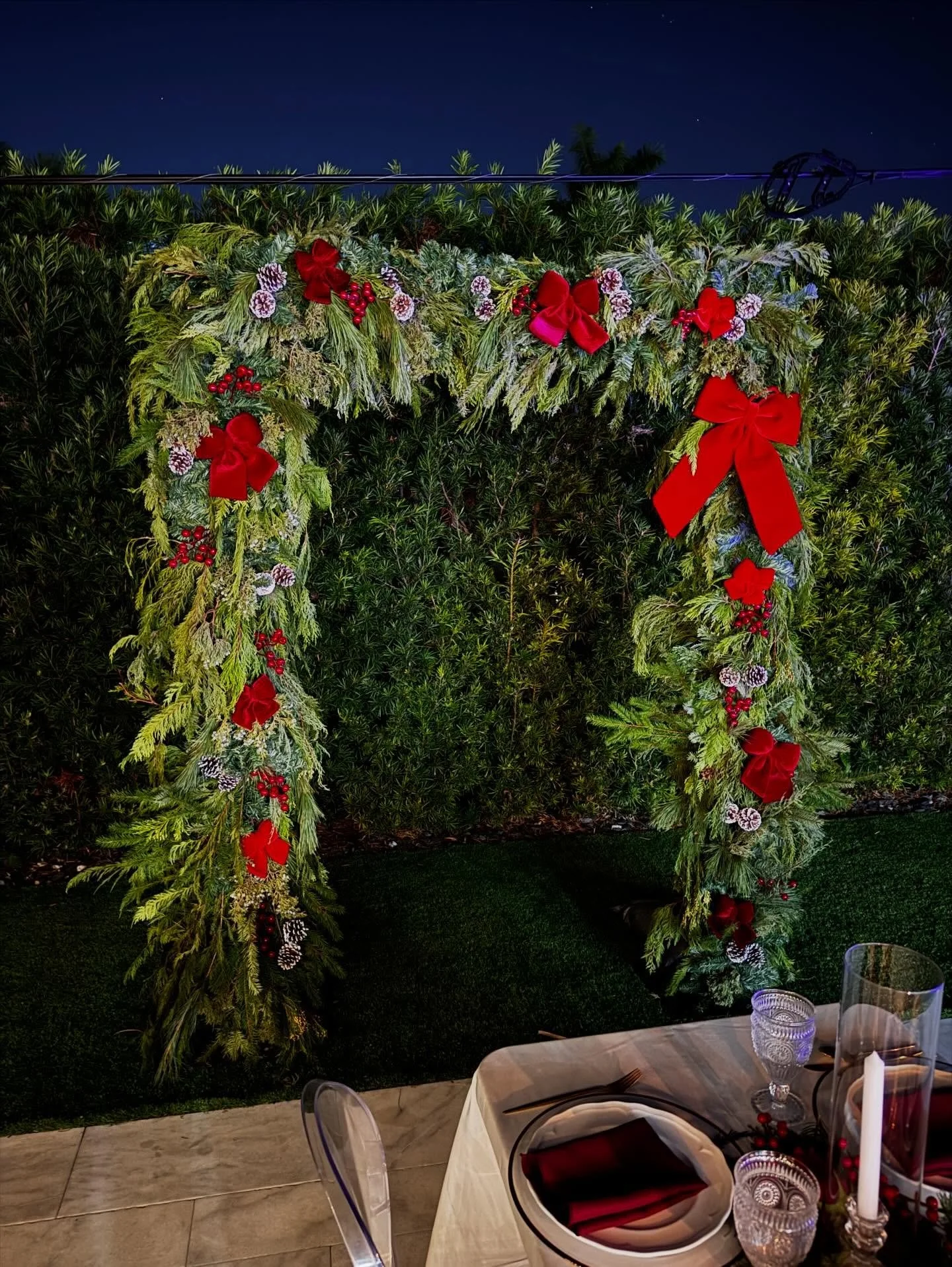 A luxurious Christmas tablescape adorned with a breathtaking pine arch. where natural beauty meets timeless holiday elegance. 🎄✨
Every detail designed to create unforgettable moments.

Hashtags:
#ChristmasDecor #HolidayTablescape #LuxuryChristmas
#P