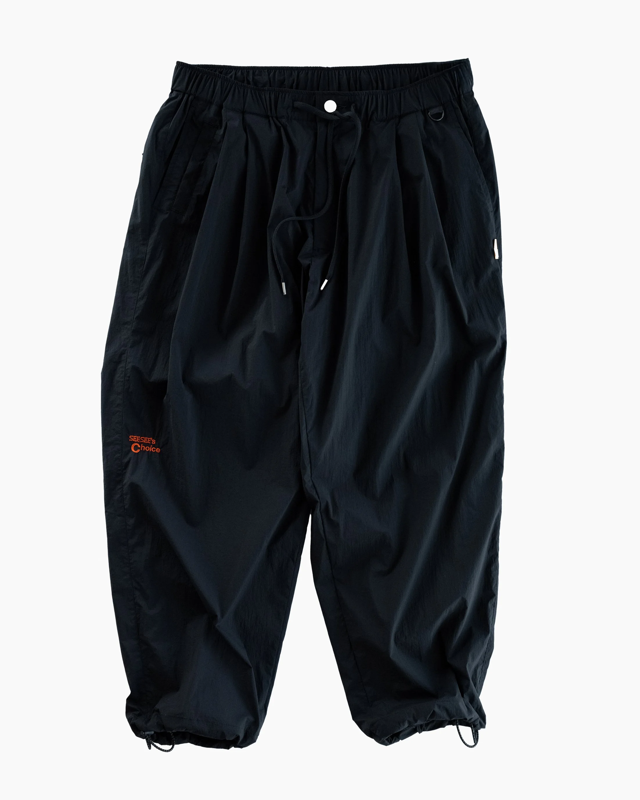 the ec x SEE SEE ‘Easy Double Pleated Trouser’ Black/Orange