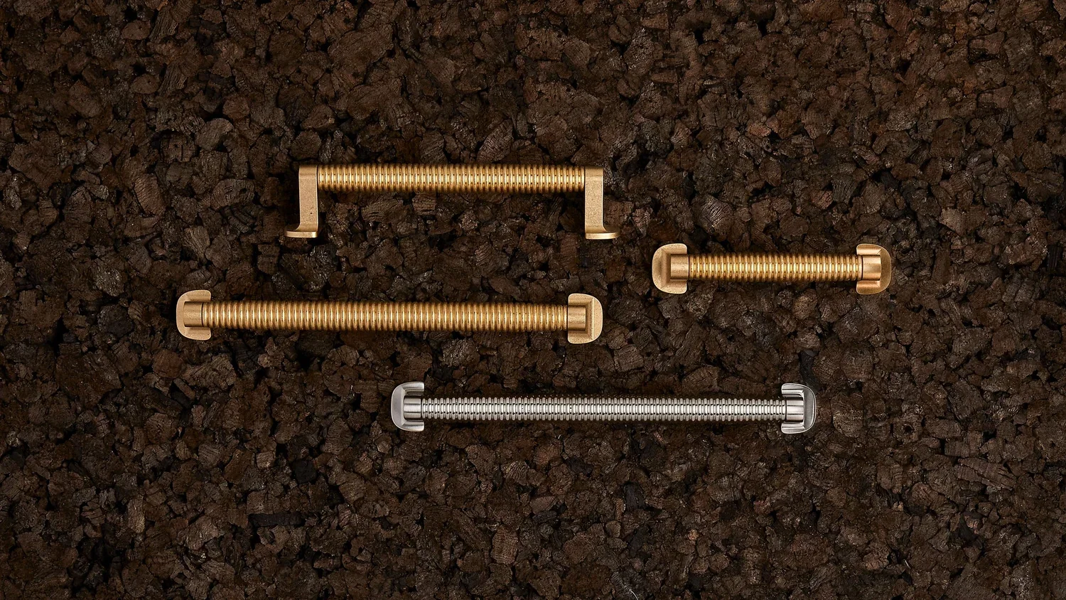 O&G-CAISSON+GROUP+-+POLISHED+BRASS+-+POLISHED+NICKEL+ON+CORK.jpg.webp