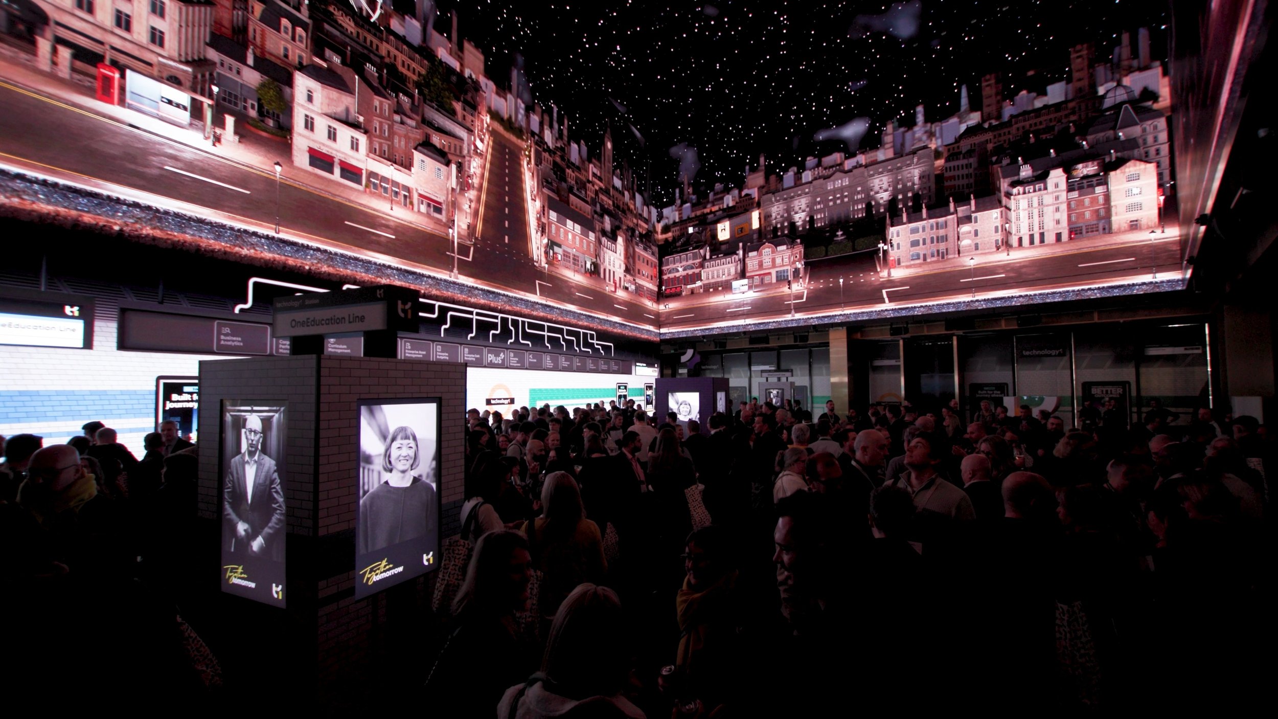 TechnologyOne guests in an immersive room with wraparound LED screens and branded display pods