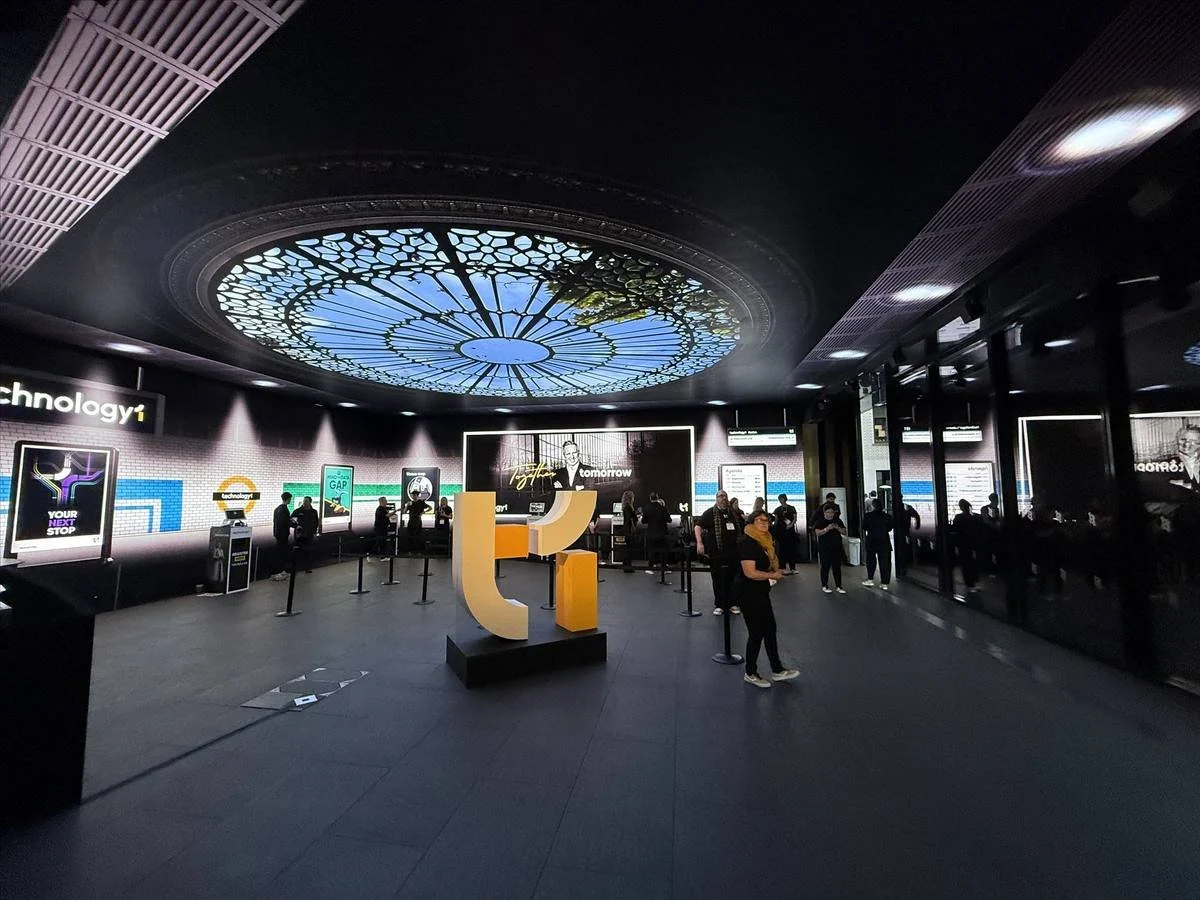 Immersive branded event space with coloured lighting