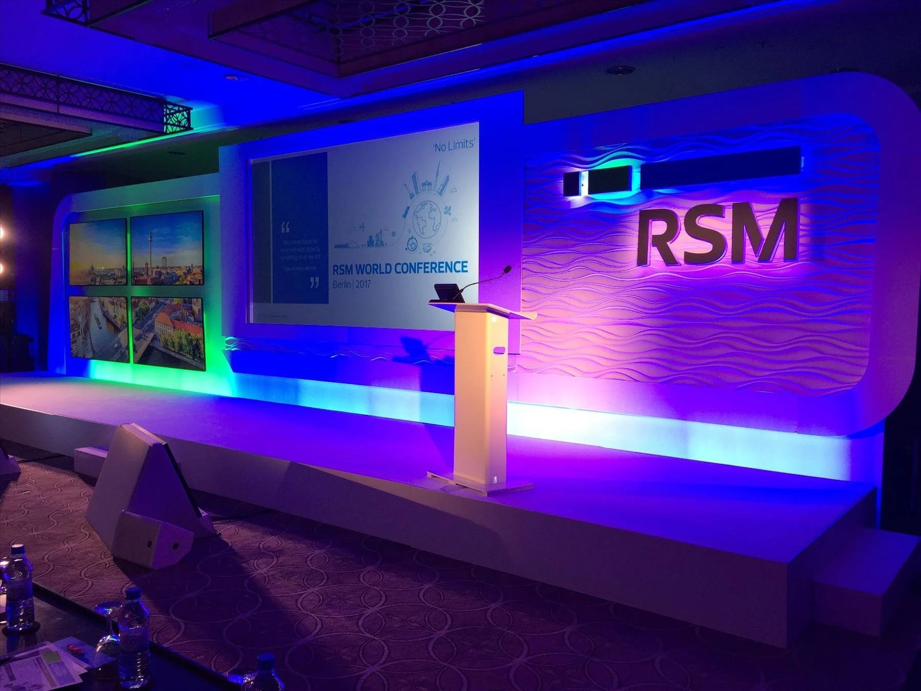 RSM conference stage in blue and purple light
