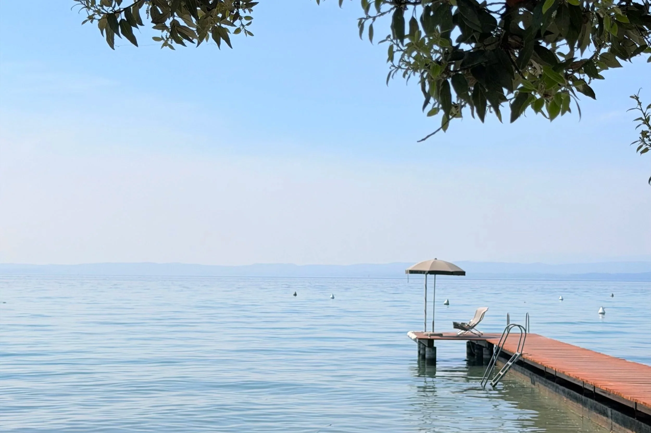 sun lounger on deck at lake garda italy