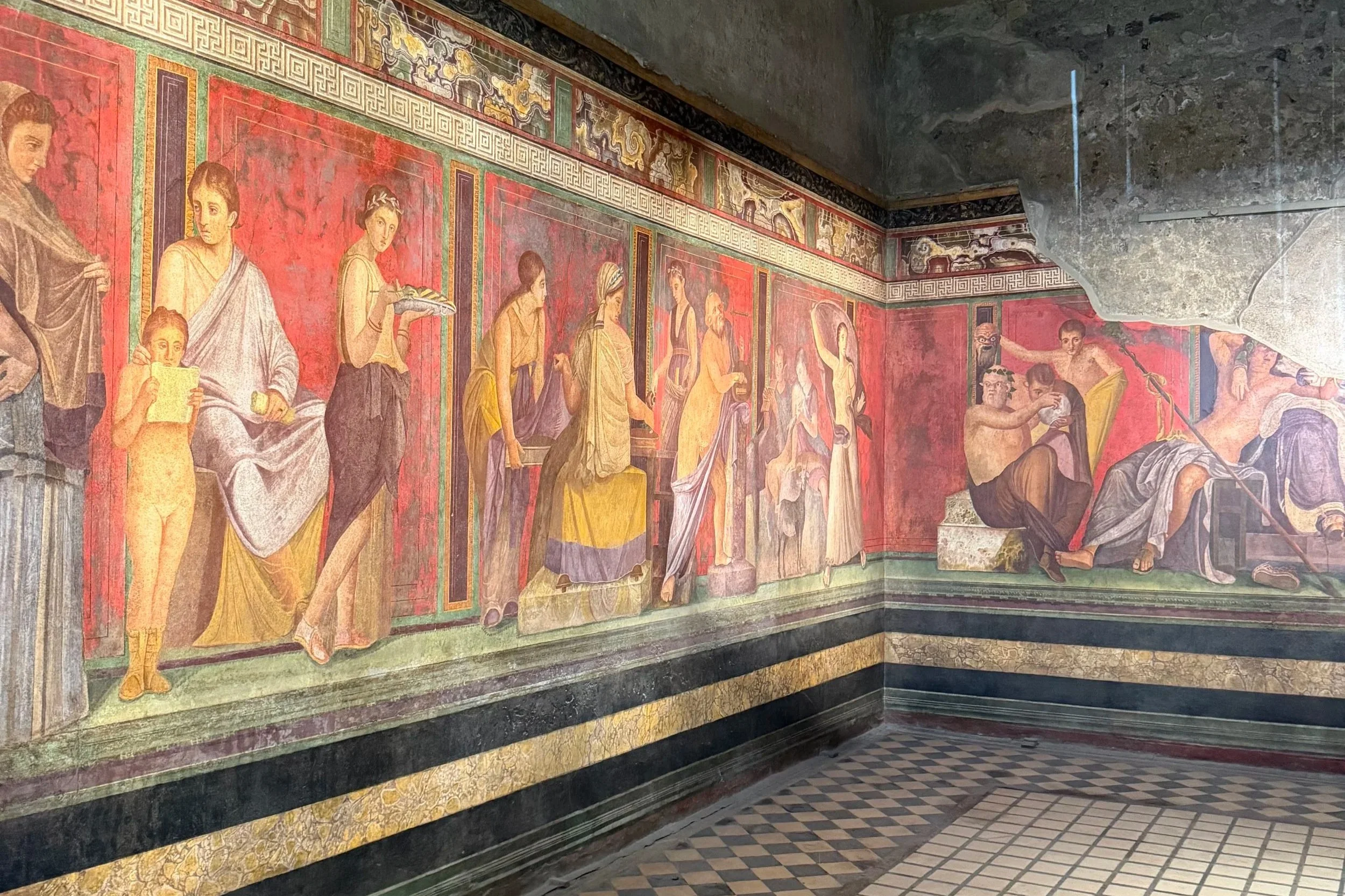 mural in the villa of mysteries pompeii