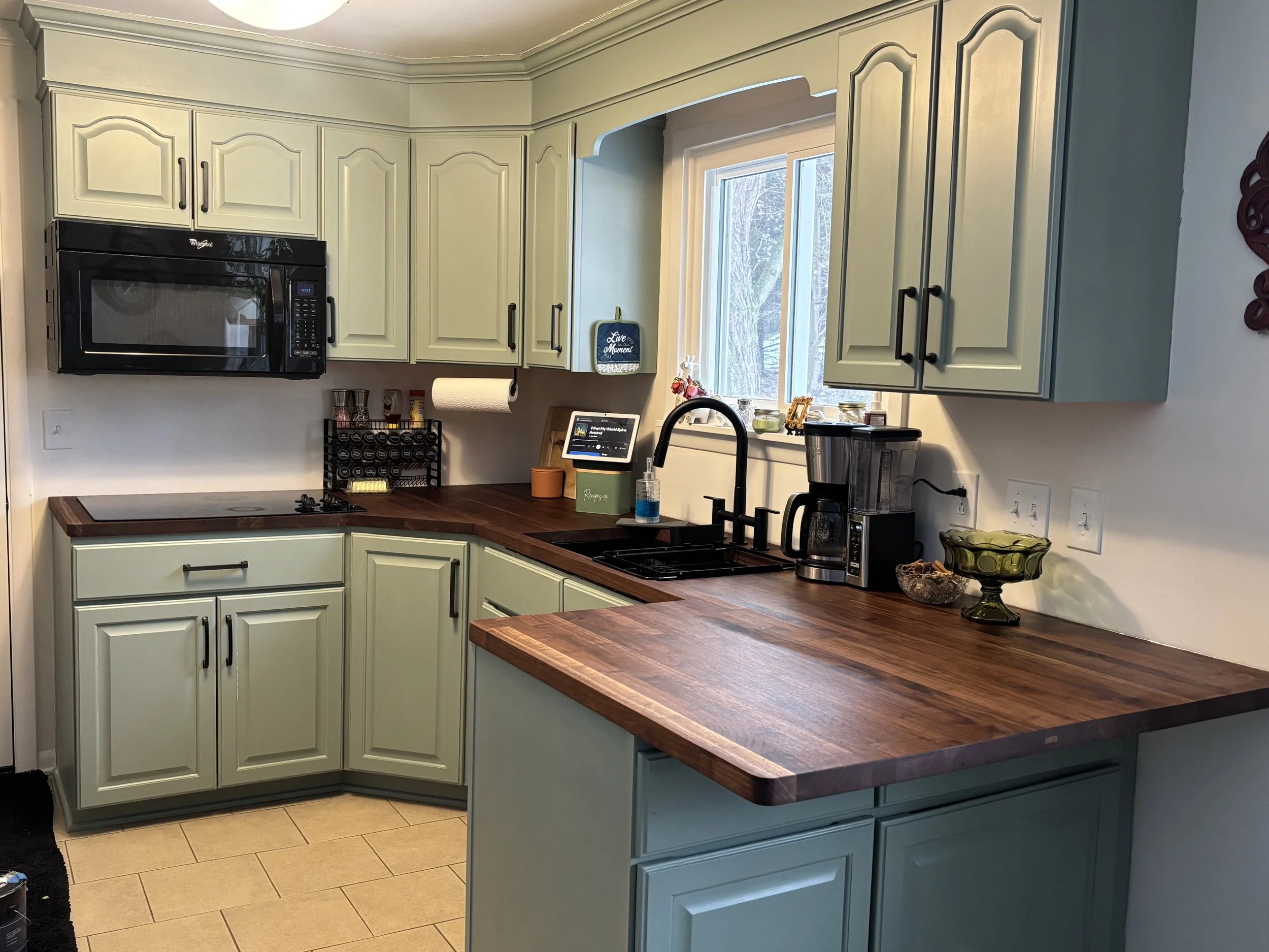 custom black walnut butcher block countertop installed in kitchen by Burky’s Woodwork