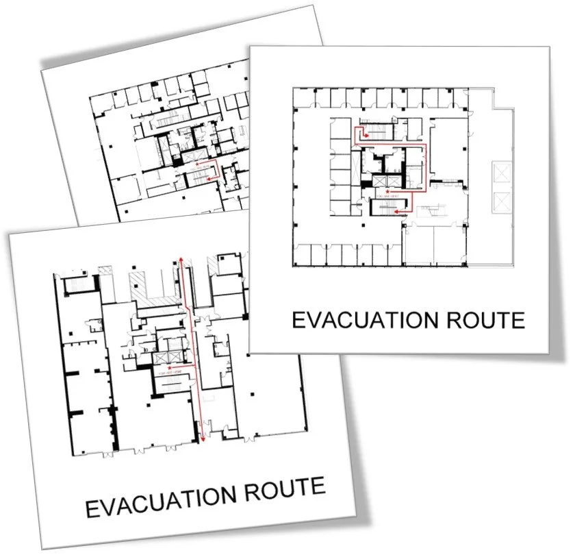 Floor plans showing evacuation routes in a building, with red lines indicating the emergency pathways.