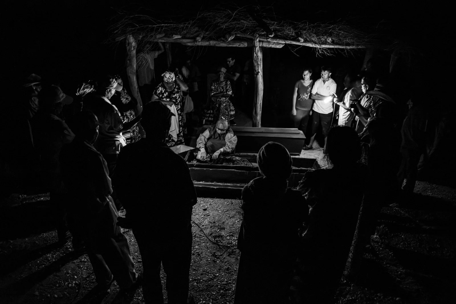 COLOMBIA 2017. Wayuu Ayulaa funeral rite in the Guajira Desert.

24 February 2017. La Guajira, Colombia. Members of a Wayuu clan gather for the Ayulaa, a funeral rite central to Wayuu cosmology in which the remains of the deceased are exhumed and giv