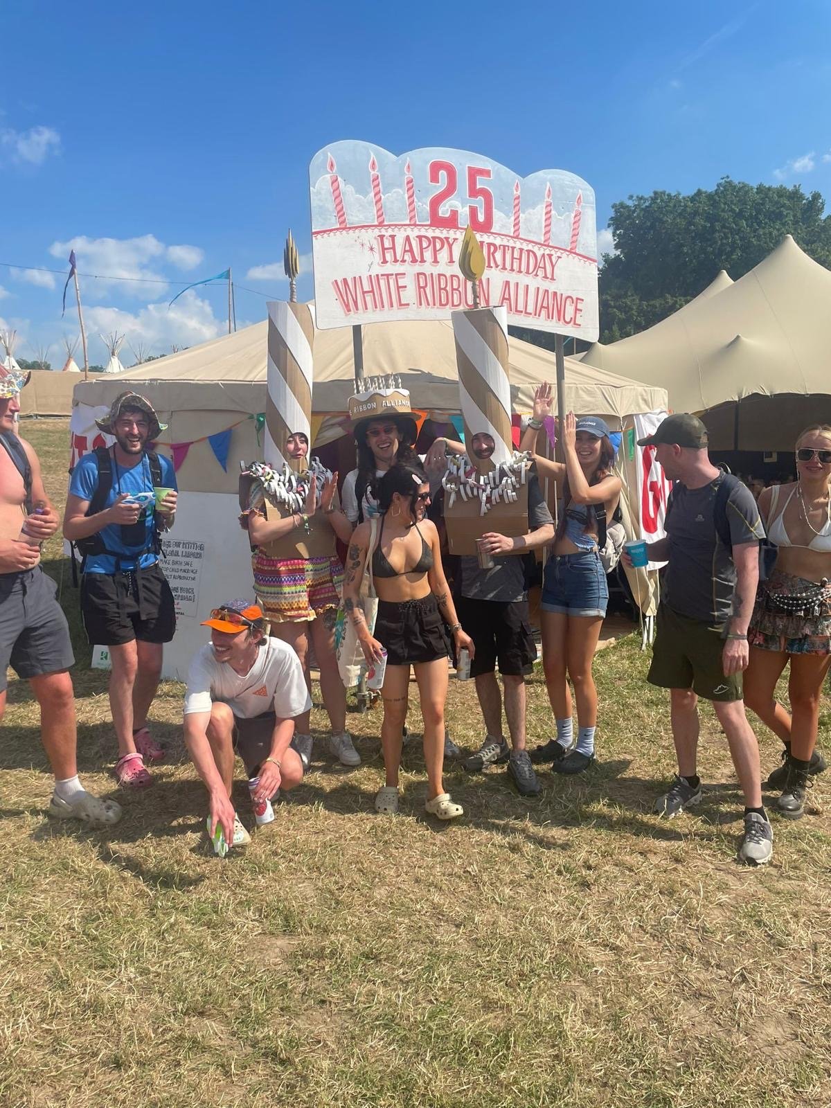Glastonbury Festival, White Ribbon Alliance Tent, Cardboard Wearable Birthday Candle Costume with icing, Environmentally Sustainable Event Design, Lottie Smith.JPG