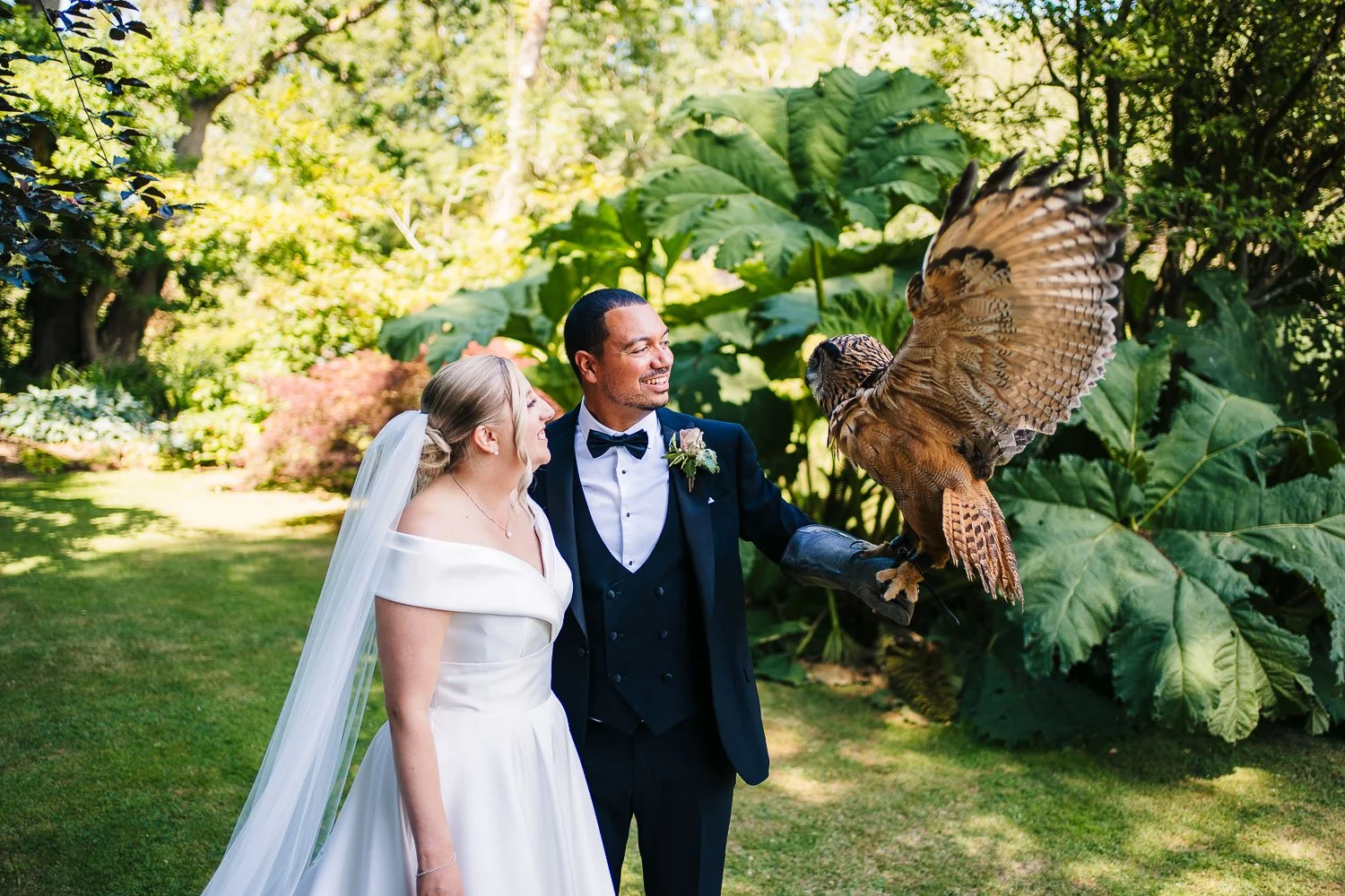 rivervale-barn-wedding-bride-and-groom-with-owl.jpg