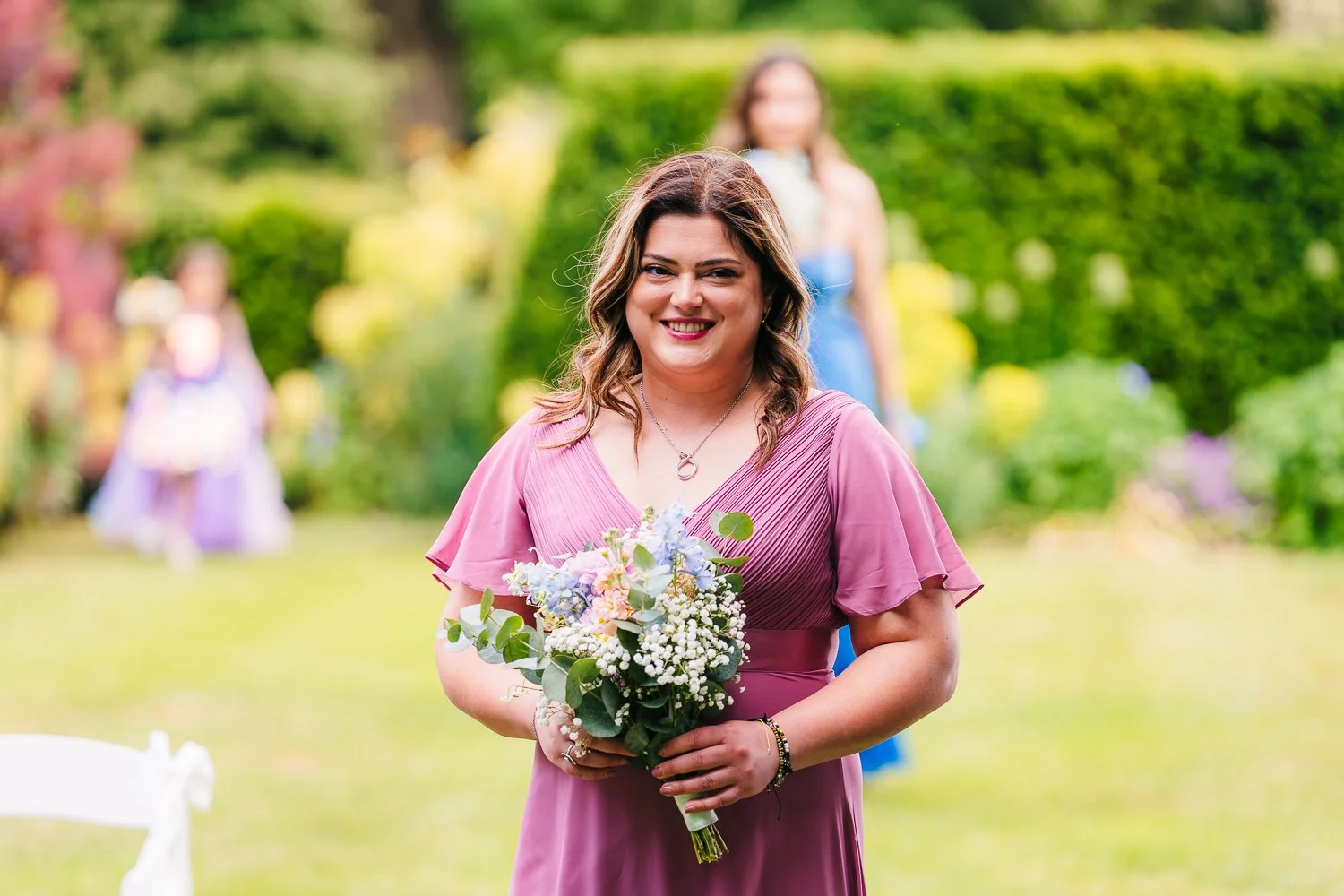 wasing-park-bridesmaid-going-down-the-aisle.jpg