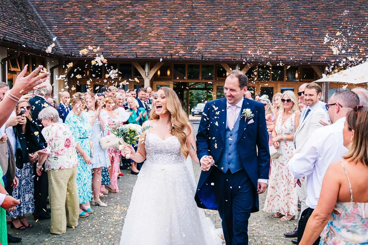 rivervale-barn-wedding-confetti-tunnel.jpg