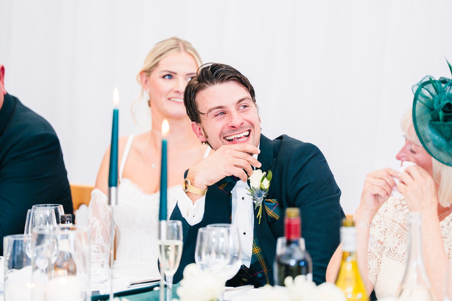 groom-laughing-at-northbrook-park.jpg