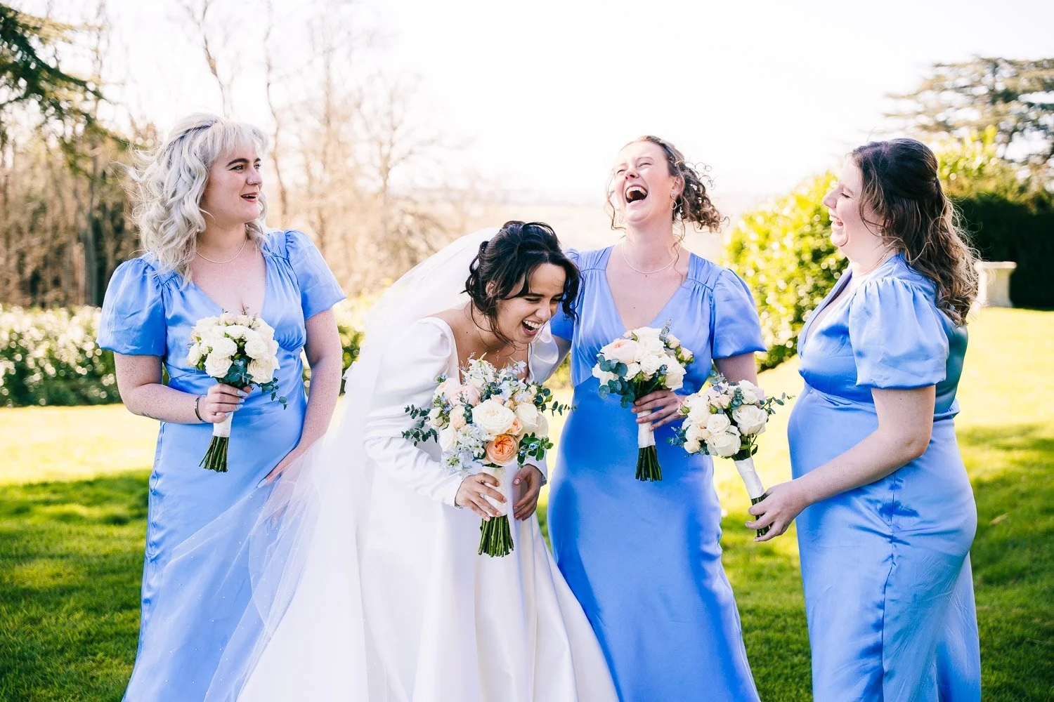 berkshire-wedding-bride-and-bridesmaids-laughing.jpg