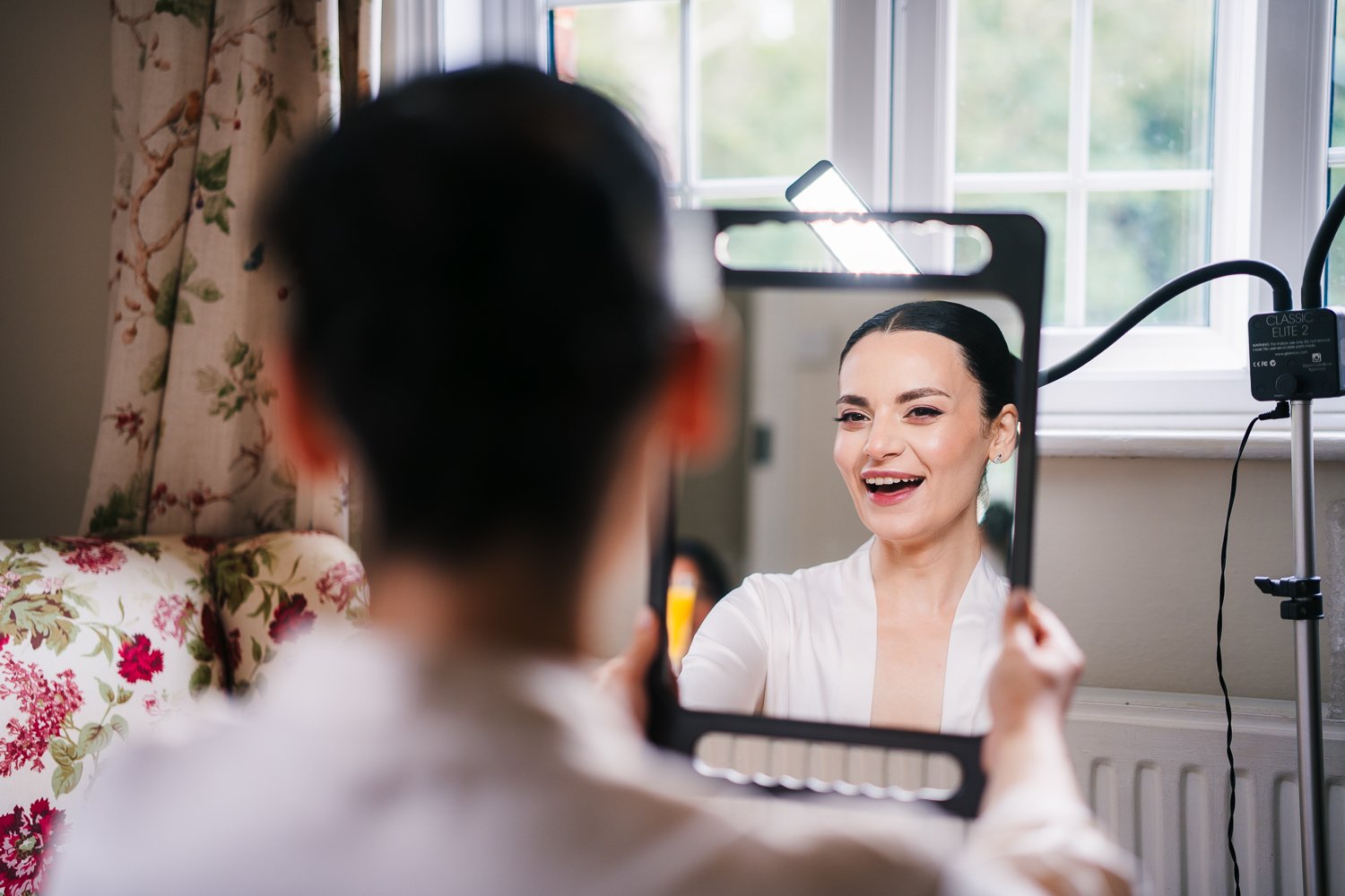 wasing-park-bride-looking-in-mirror.jpg