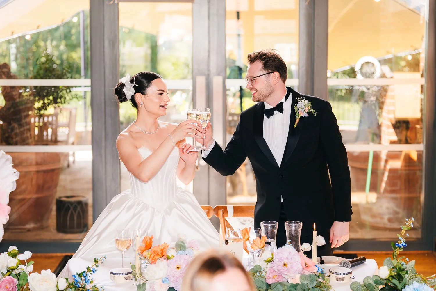 wasing-park-wedding-bride-and-groom-cheers.jpg