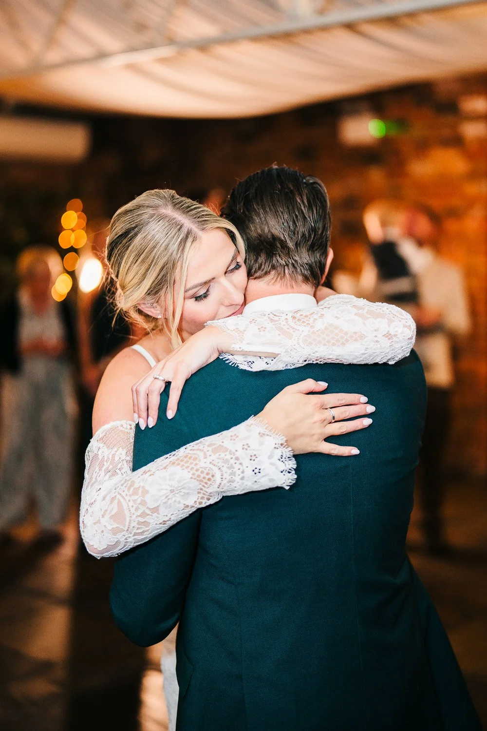 bride-and-groom-first-dance-at-surrey-wedding-venue.jpg