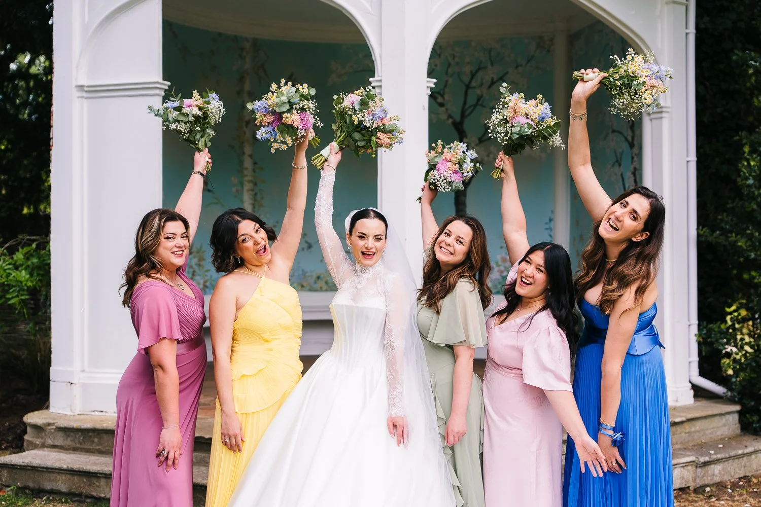 wasing-park-bride-and-bridesmaids-cheering.jpg