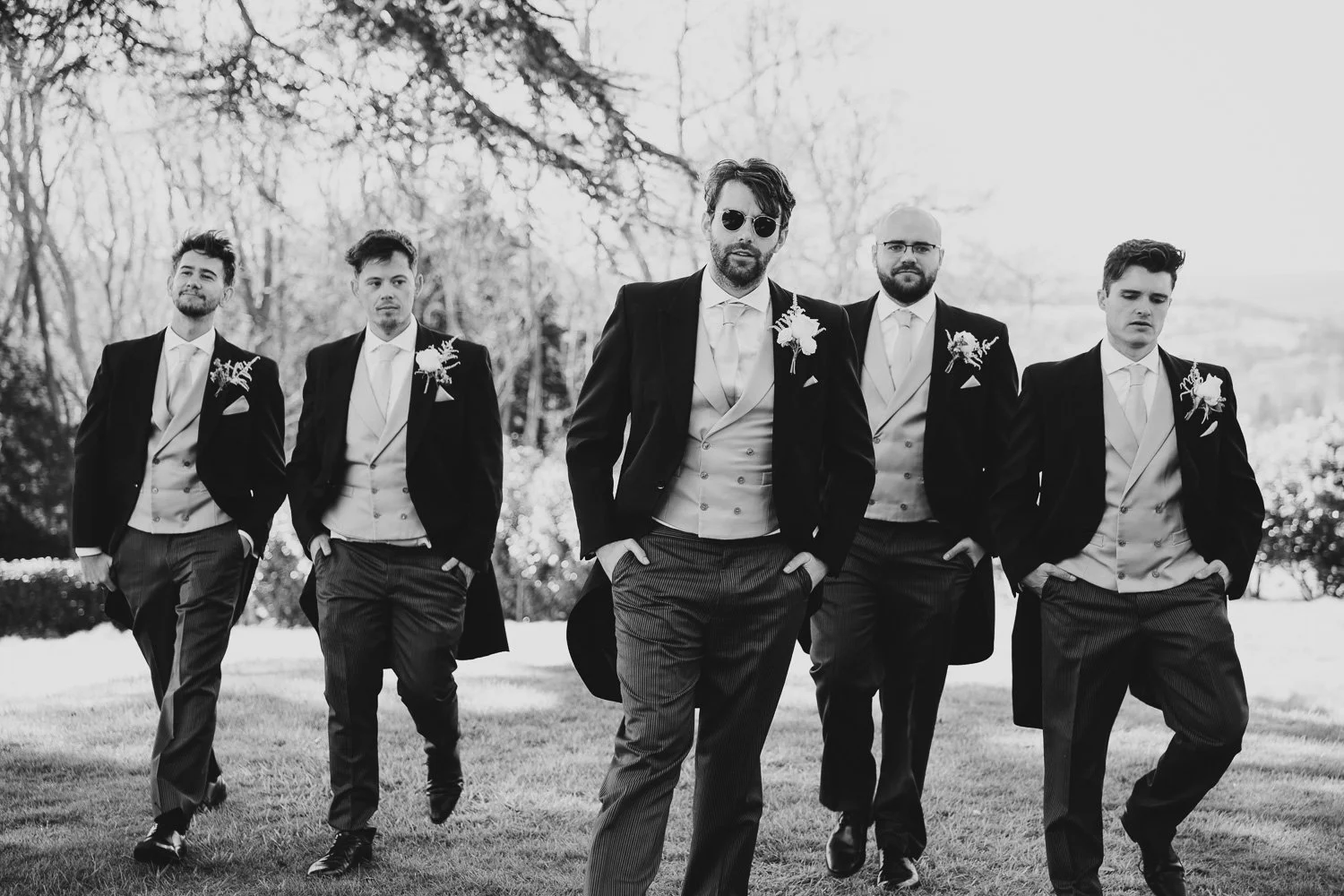 hedsor-house-groom-and-groomsmen-walking.jpg