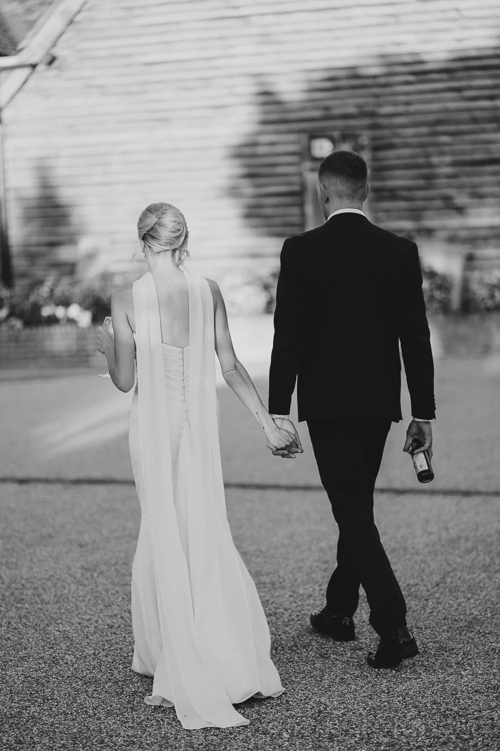 rivervale-barn-berkshire-wedding-couple-candid-at-sunset.jpg
