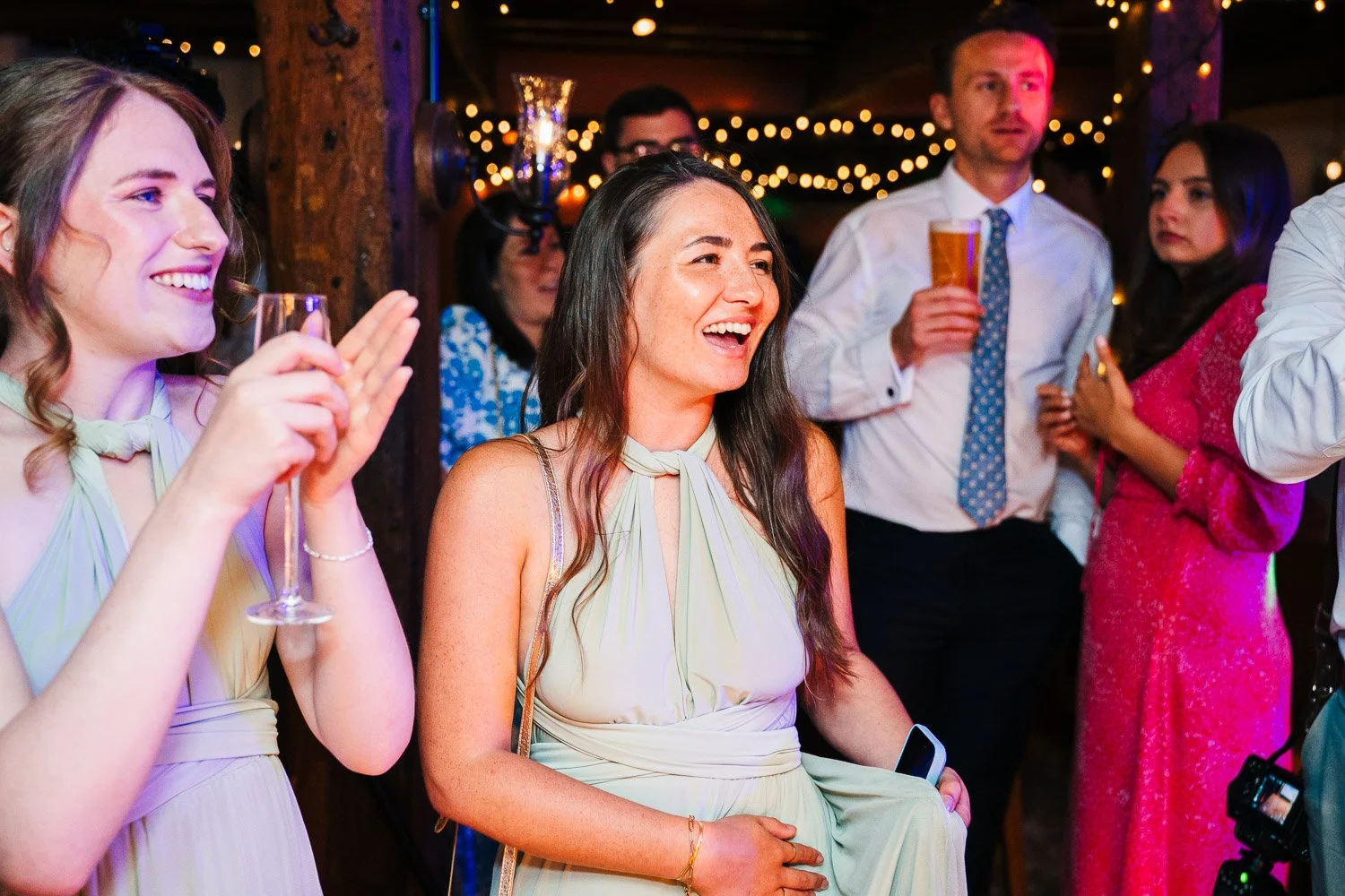 bartons-mill-wedding-bridesmaid-laughing-candid.jpg