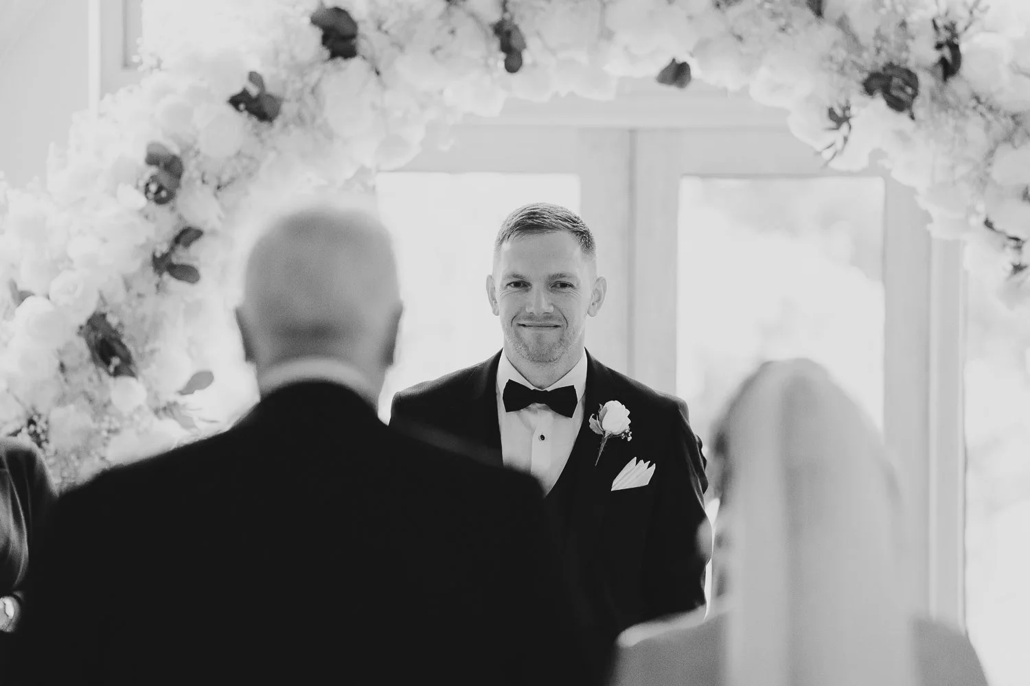 rivervale-barn-berkshire-wedding-groom-reaction.jpg