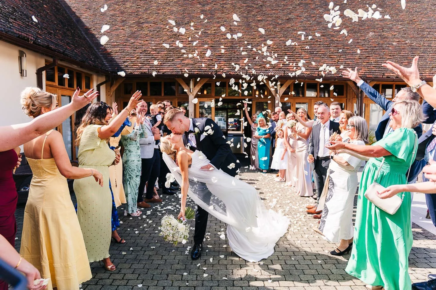rivervale-barn-berkshire-wedding-confetti-kiss.jpg