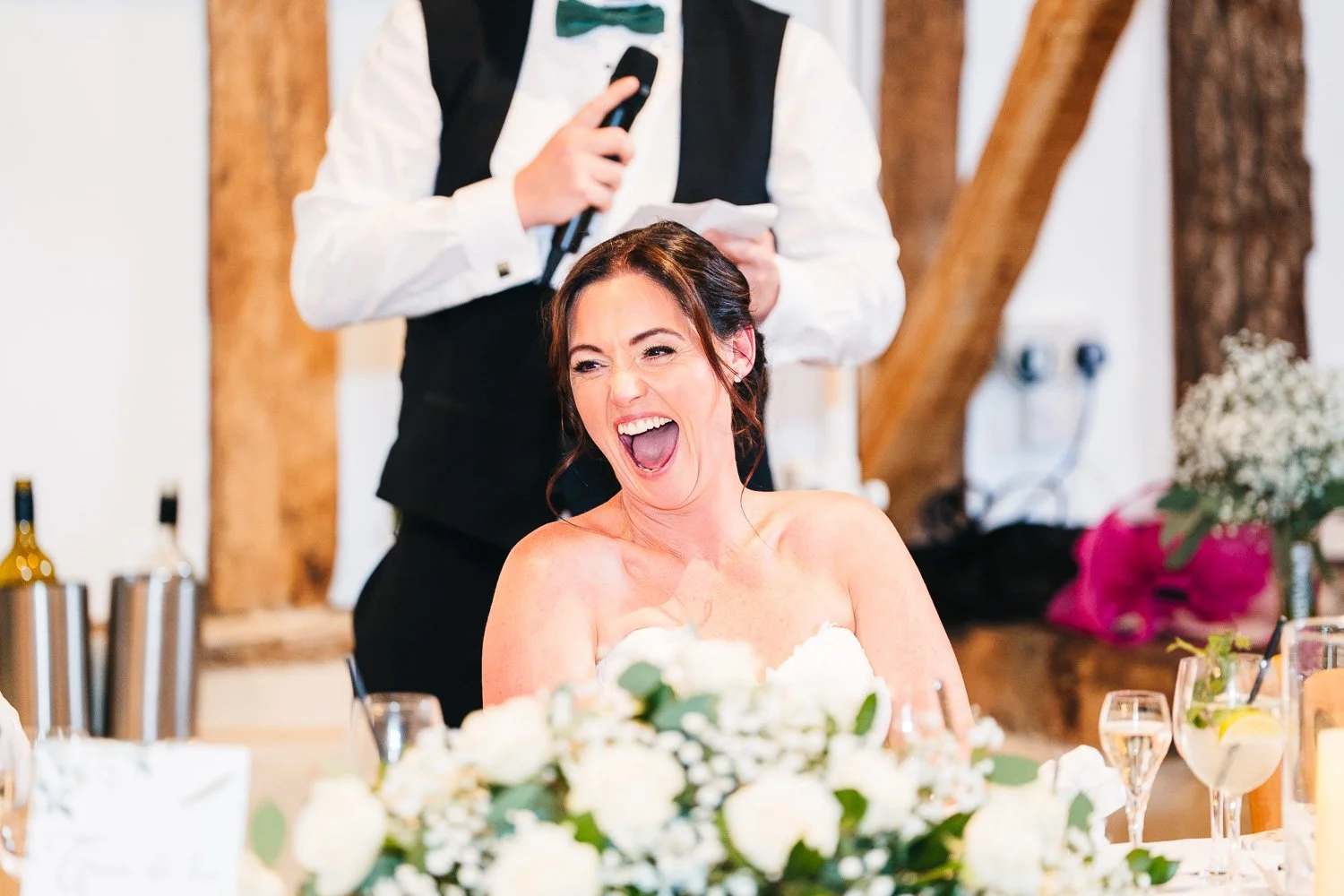 berkshire-wedding-bride-laughing-at-speech.jpg