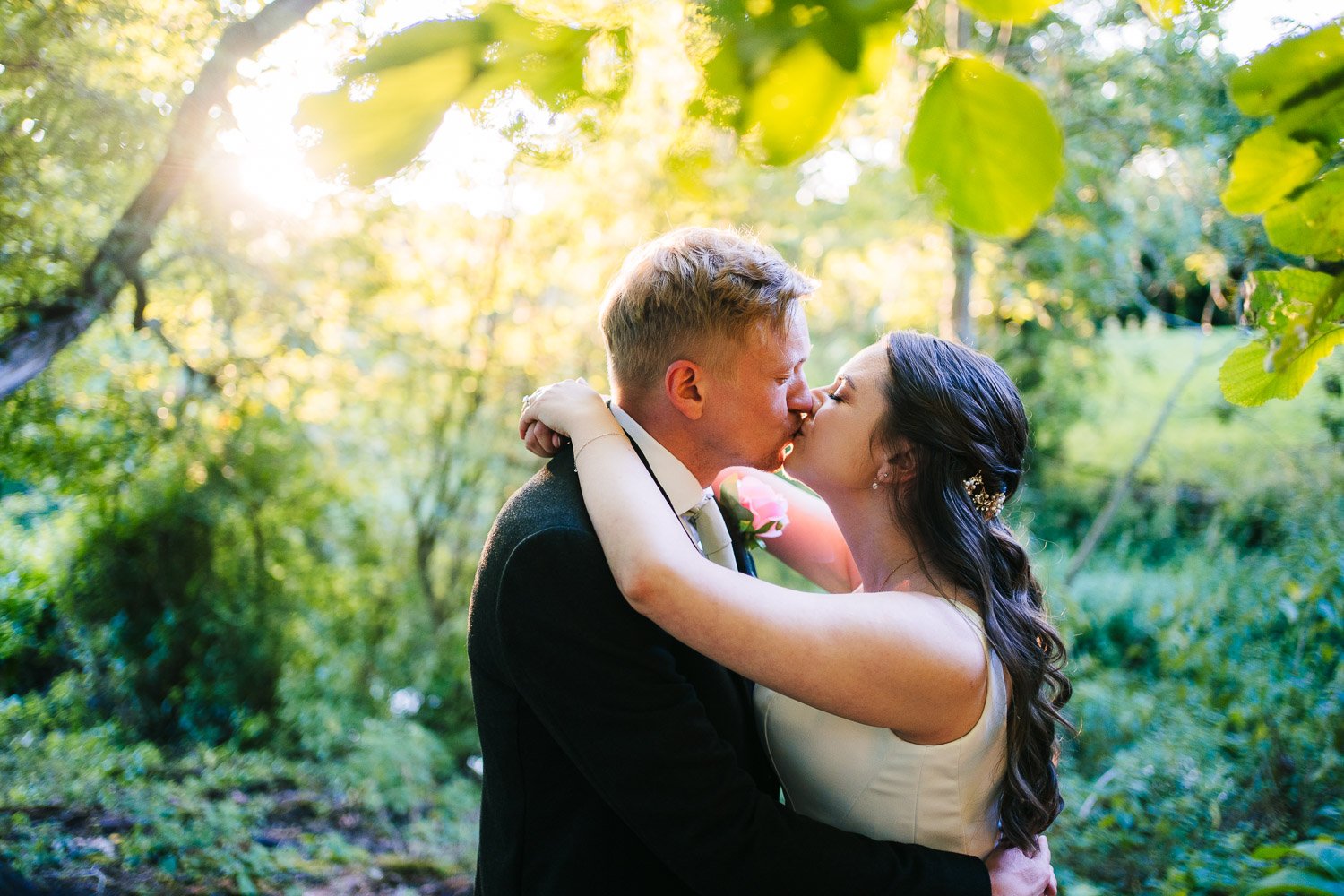hampshire-wedding-couple-share-a-kiss-at-sunset.jpg