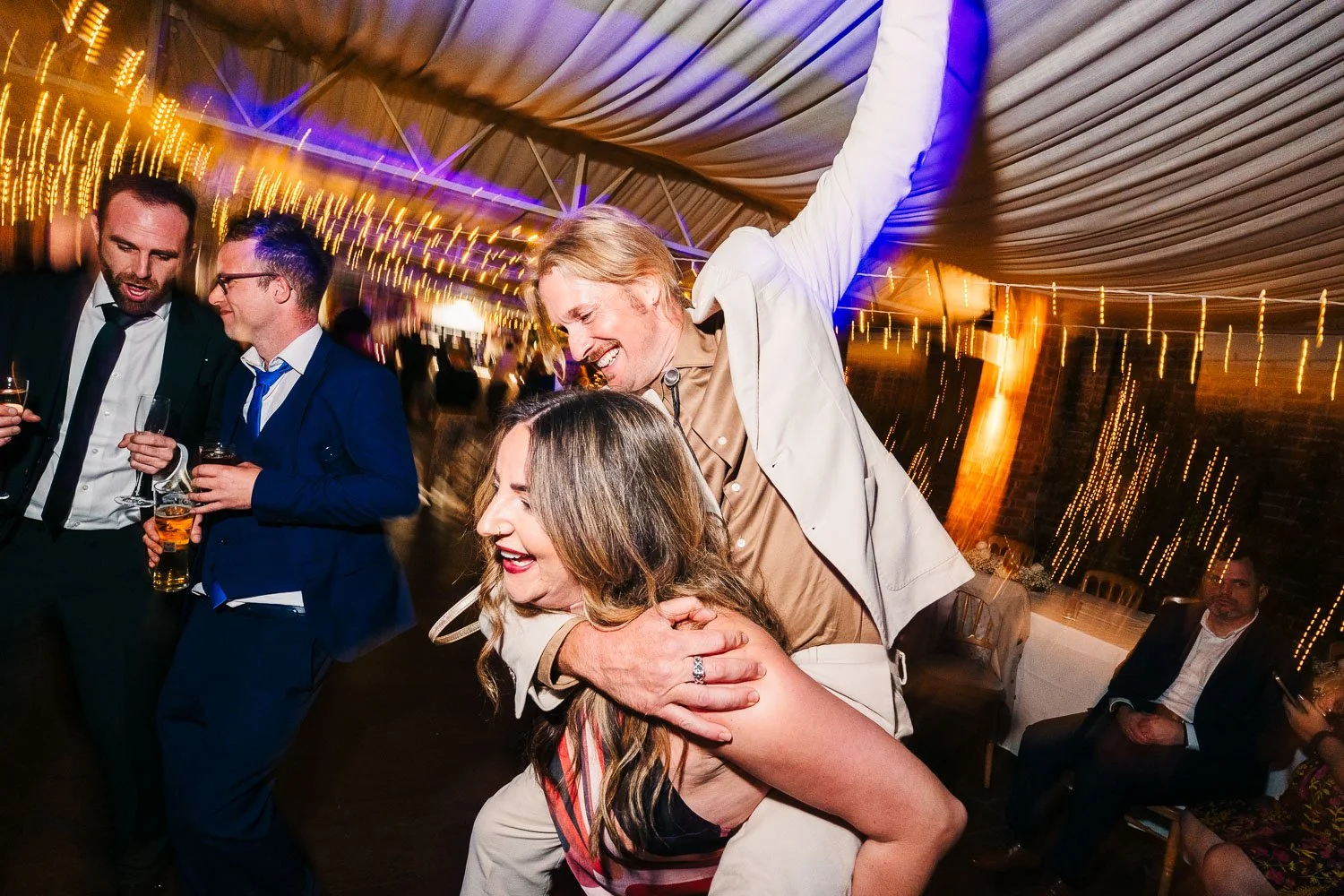 northbrook-park-wedding-reception-piggy-back.jpg