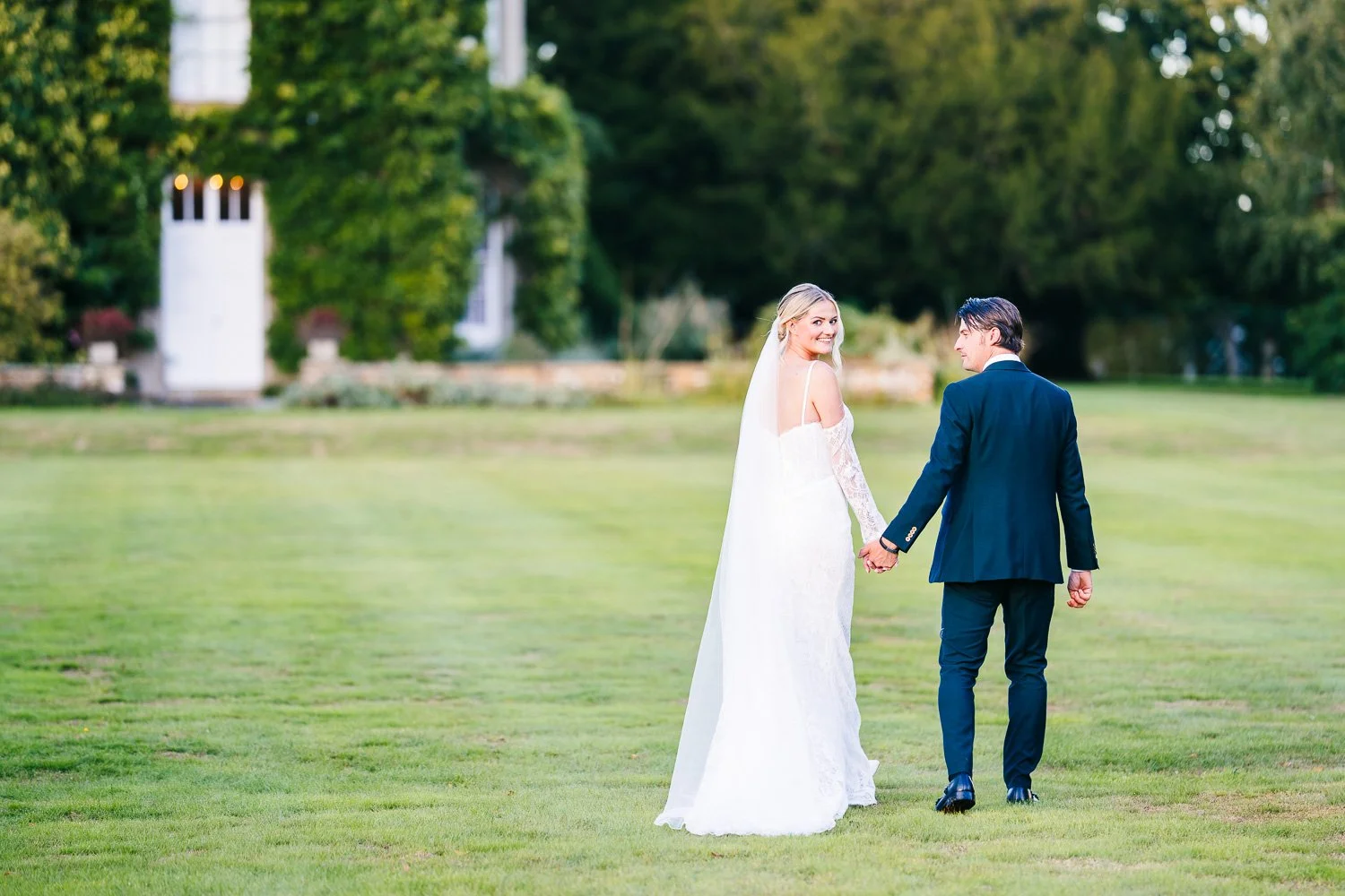 bride-looking-back-at-the-camera-at-surrey-venue.jpg