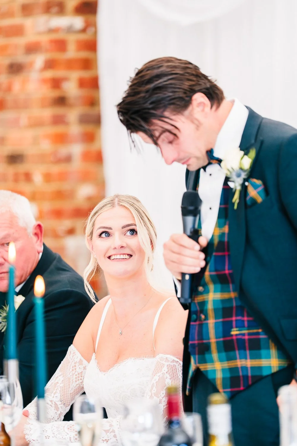 hampshire-wedding-groom-speech-and-bride-smiling.jpg