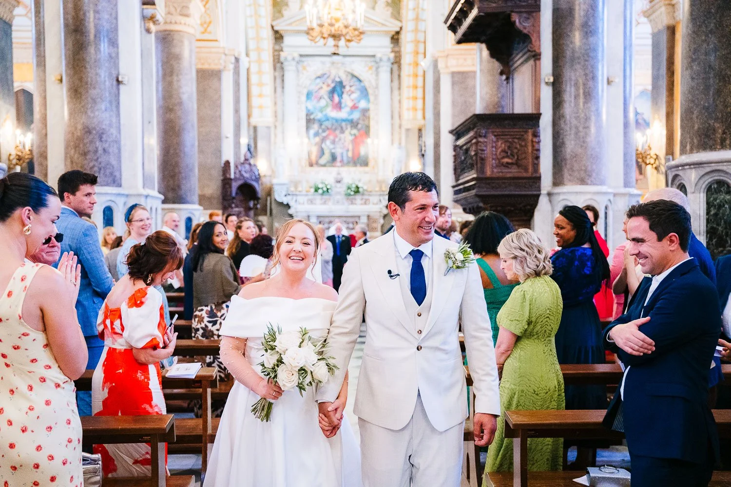destination-italy-wedding-berkshire-photographer-bride-and-groom-walking-down-the-aisle.jpg