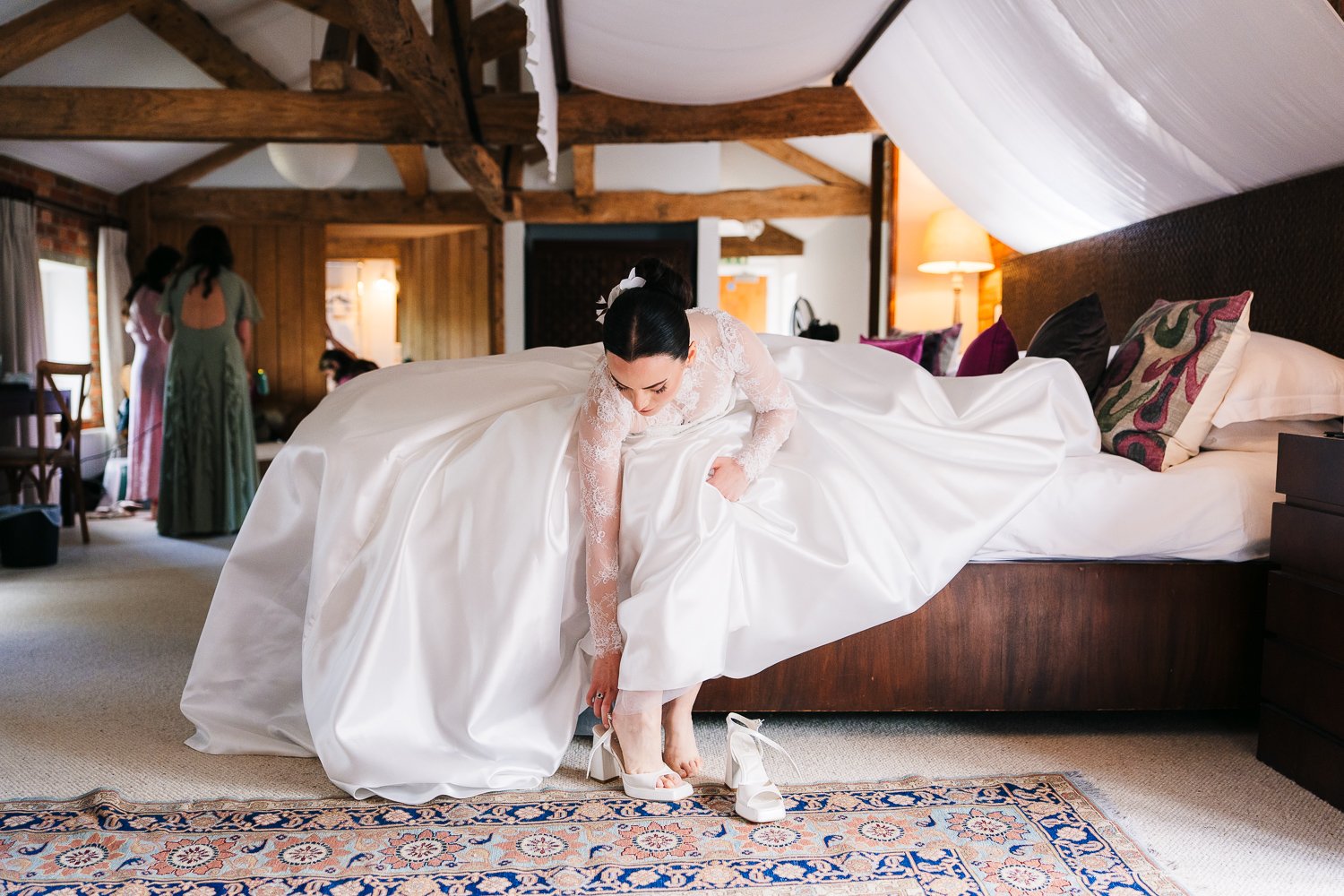 wasing-park-bride-putting-wedding-shoes-on.jpg