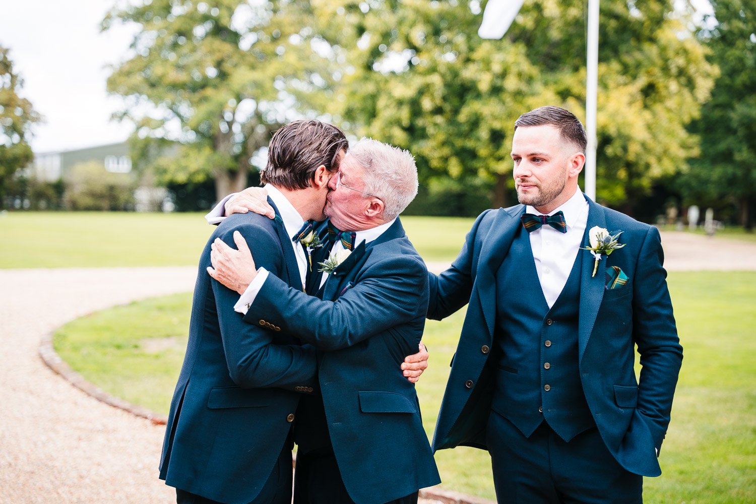 hampshire-wedding-groom-hug-with-dad.jpg