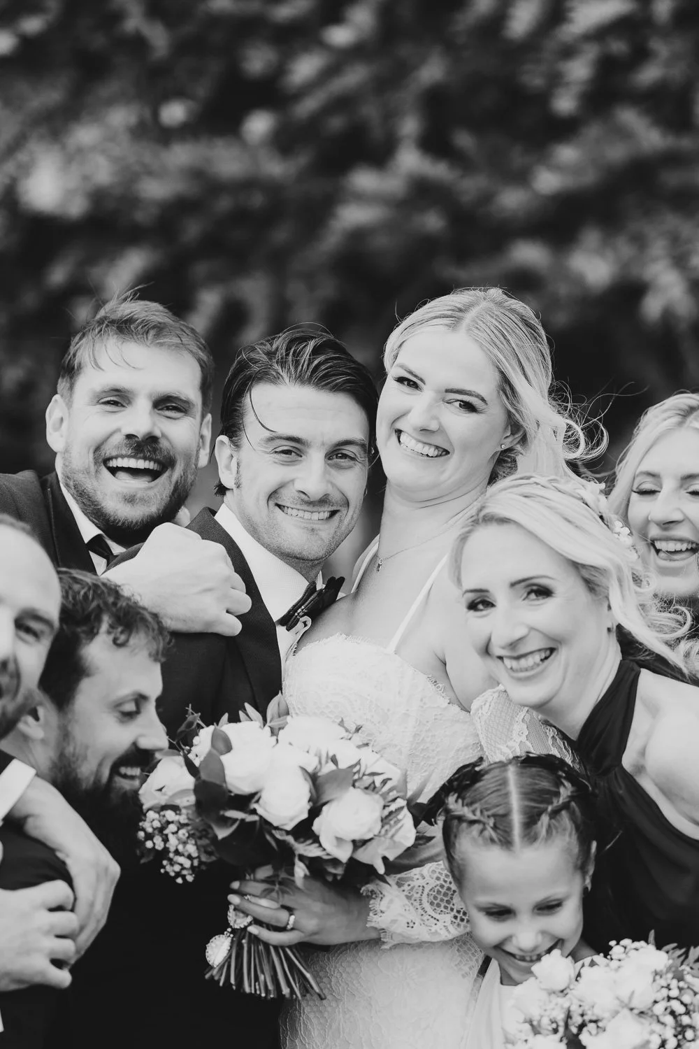 northbrook-park-bridal-party-hug-black-and-white.jpg