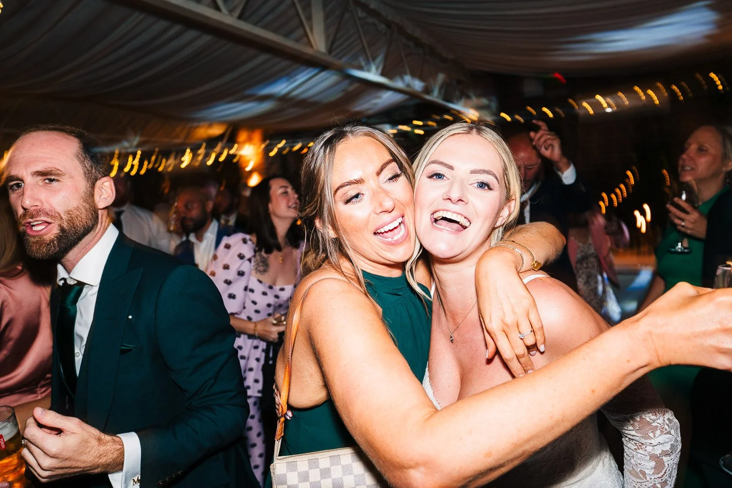 northbrook-park-bride-and-bridesmaid-dancing.jpg