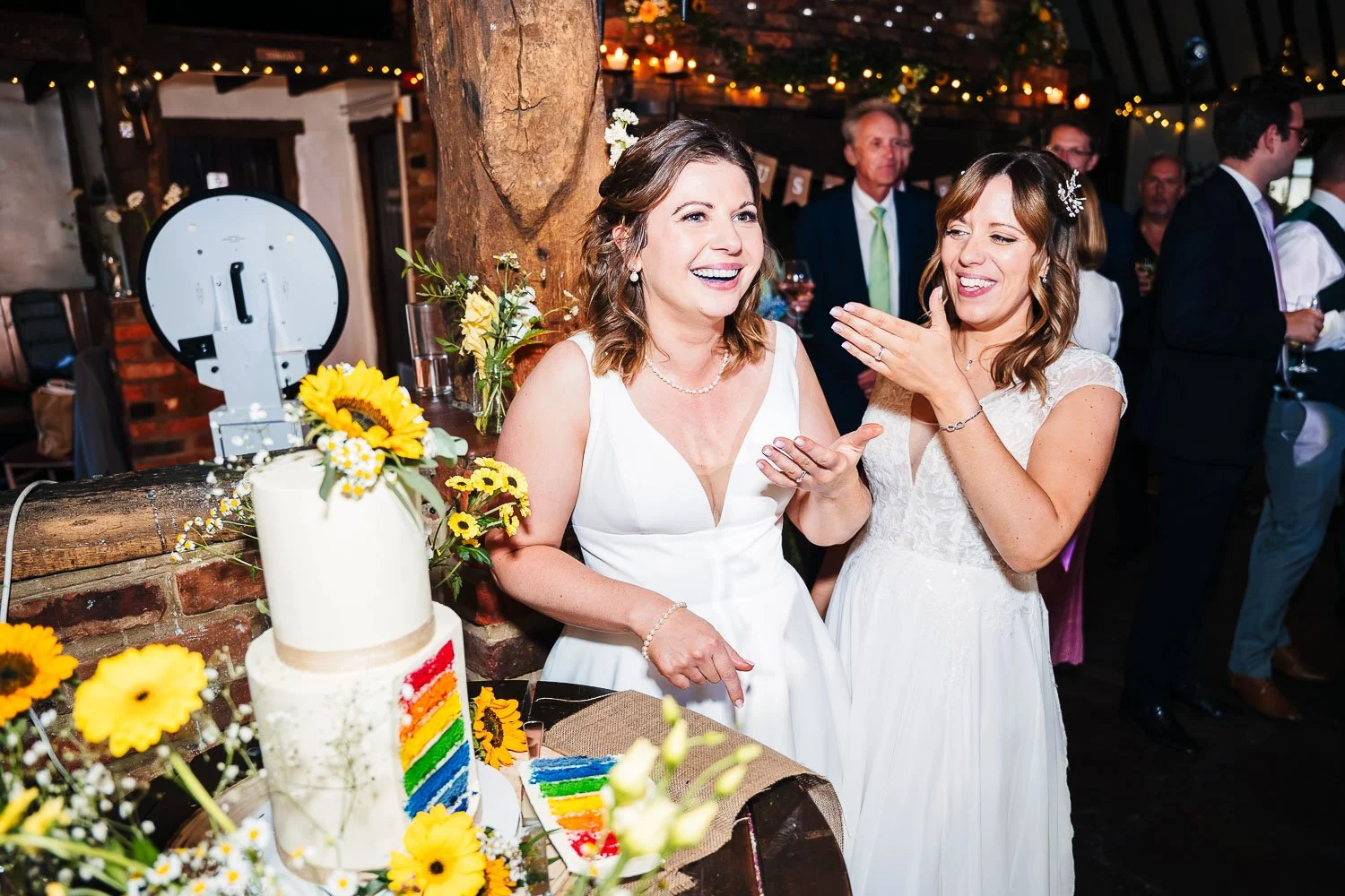 hampshire-same-sex-wedding-meade-hall-brides-cake-cut.jpg