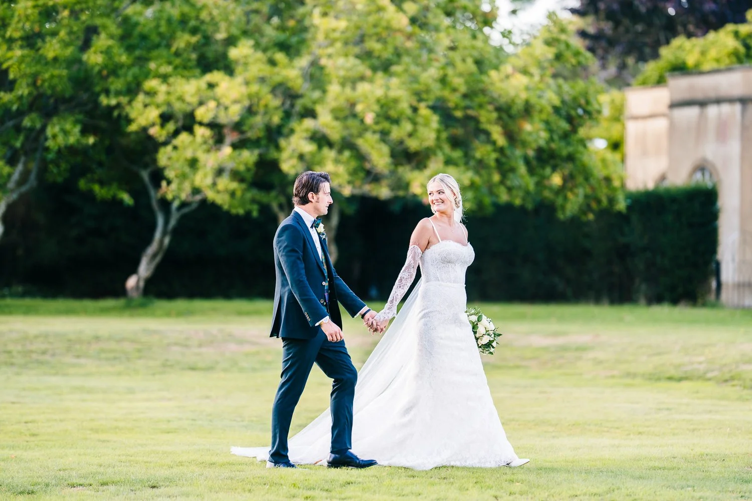 couple-walking-in-gardens-at-hampshire-venue.jpg