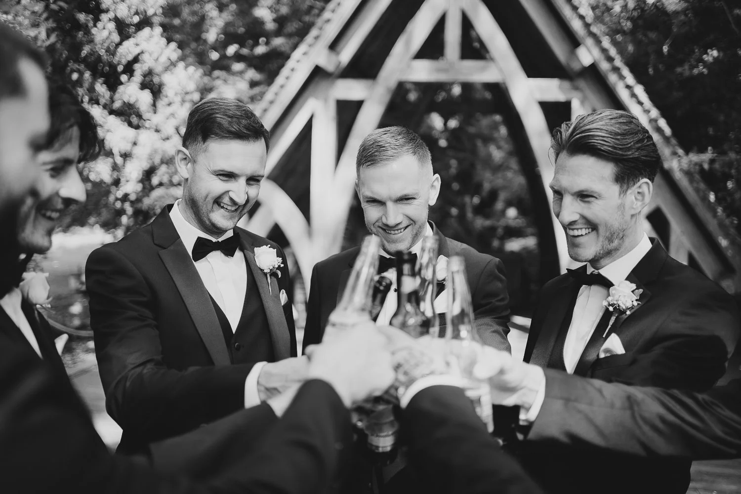 rivervale-barn-berkshire-wedding-groomsmen-cheers.jpg