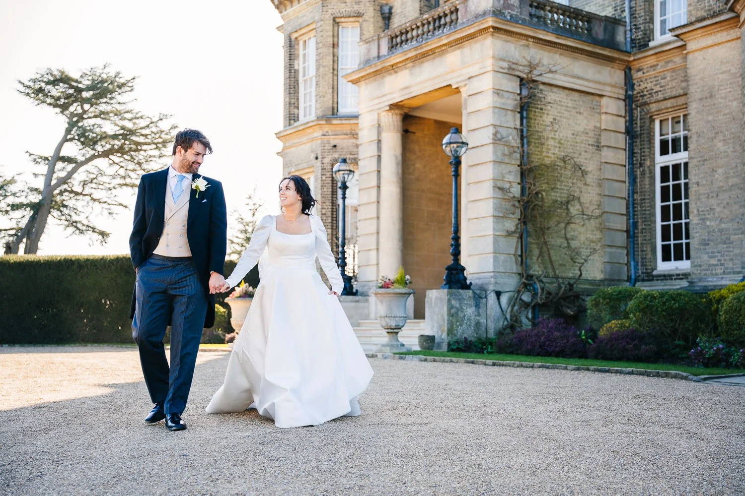 hedsor-house-bride-and-groom-relaxed-walking.jpg