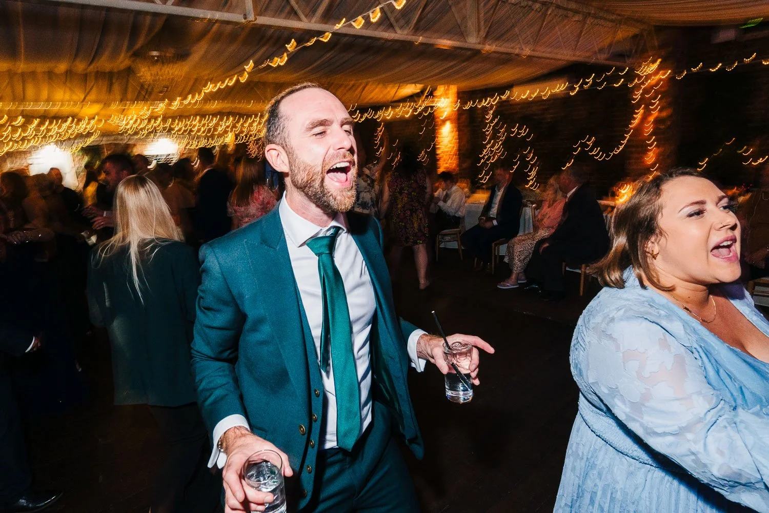 northbrook-park-wedding-reception-cheering.jpg