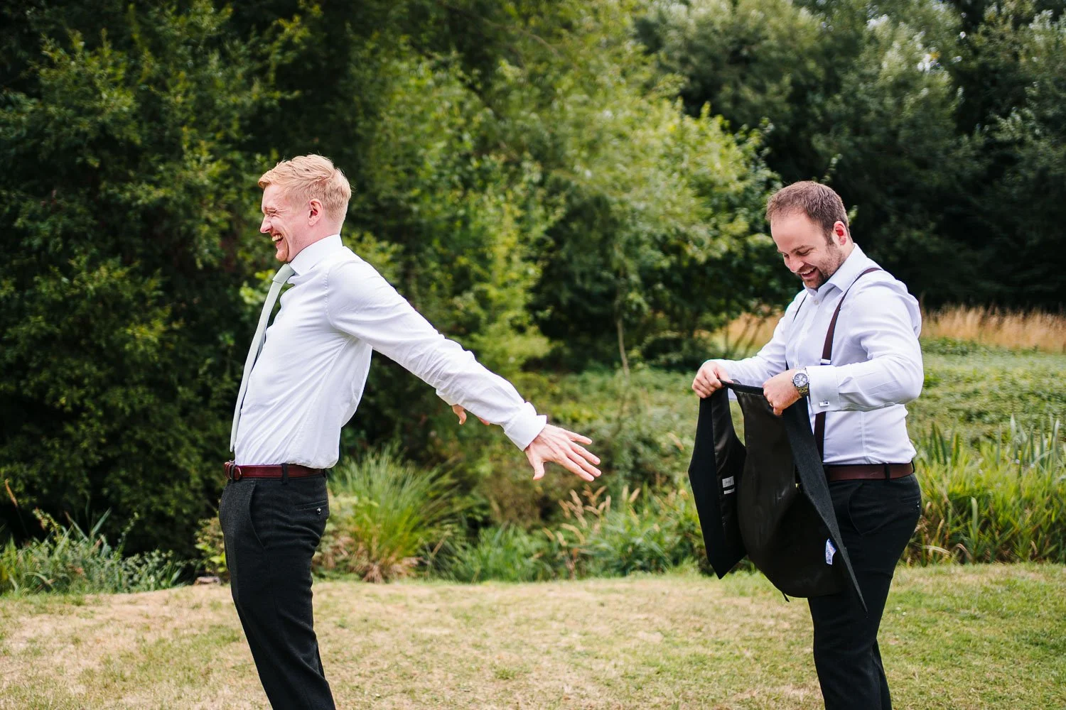 bartons-mill-wedding-groomsmen-helping-groom-get-ready.jpg