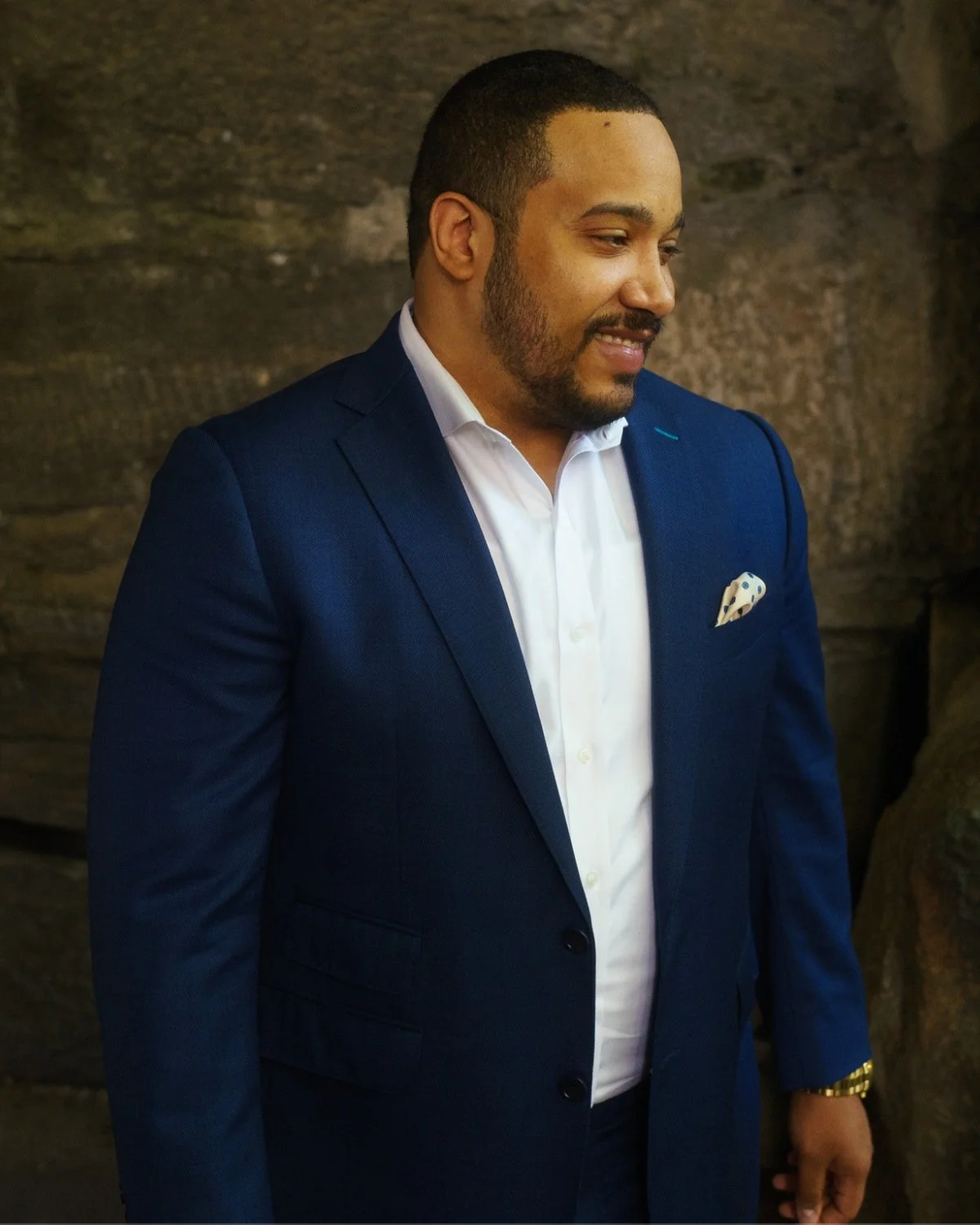 Client wearing a made to measure navy two piece suit
