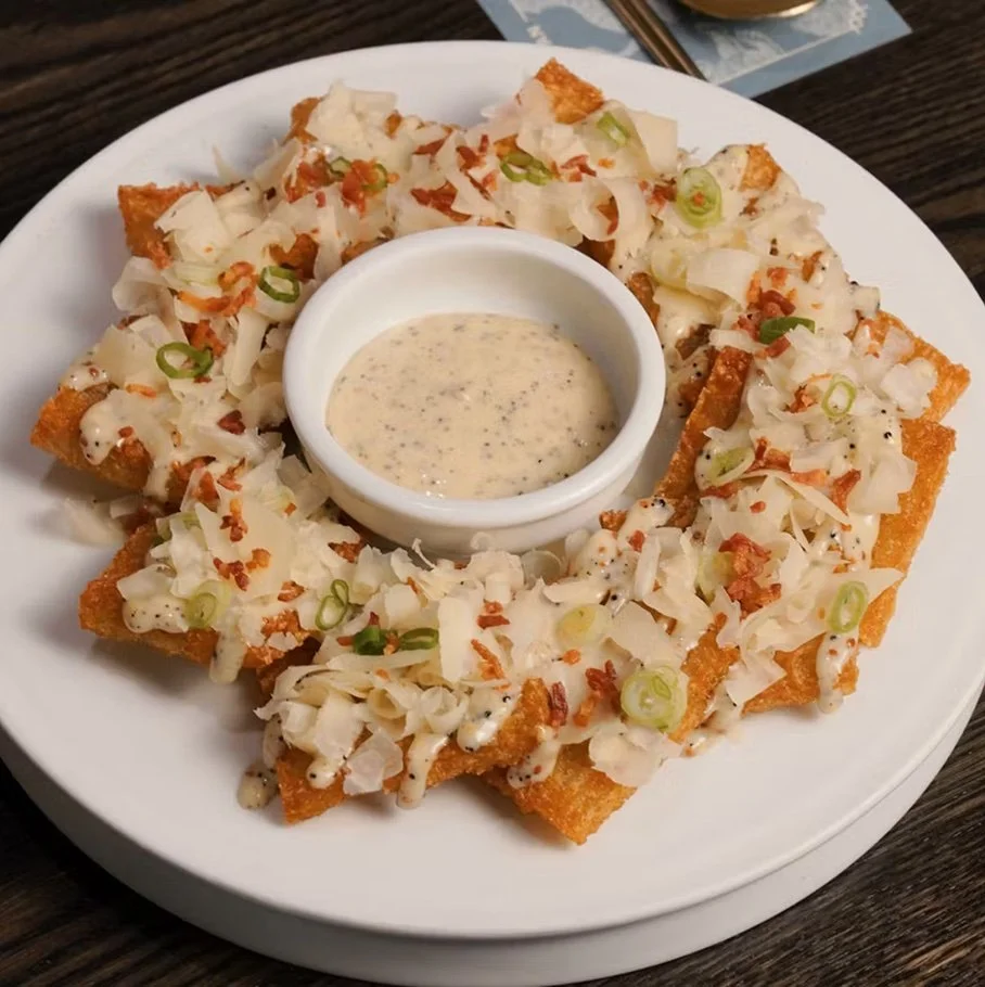 Crispy Korean potato pancake topped with truffle mayo, parmesan cheese, and bacon, served with a dipping sauce