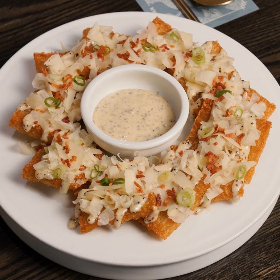 Truffle potato pancake — crispy Korean potato pancake topped with truffle mayo, parmesan cheese, and bacon