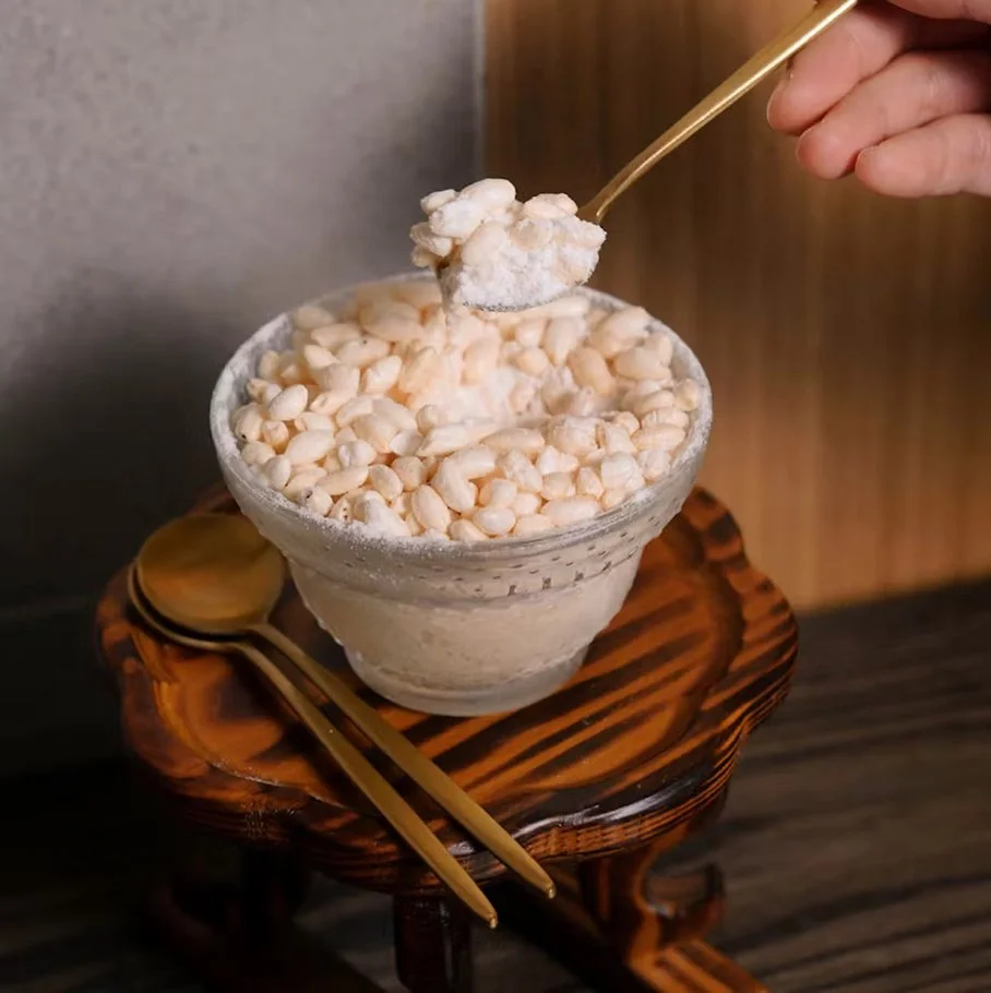 Frozen makgeolli — frozen Korean rice wine dessert topped with puffed rice