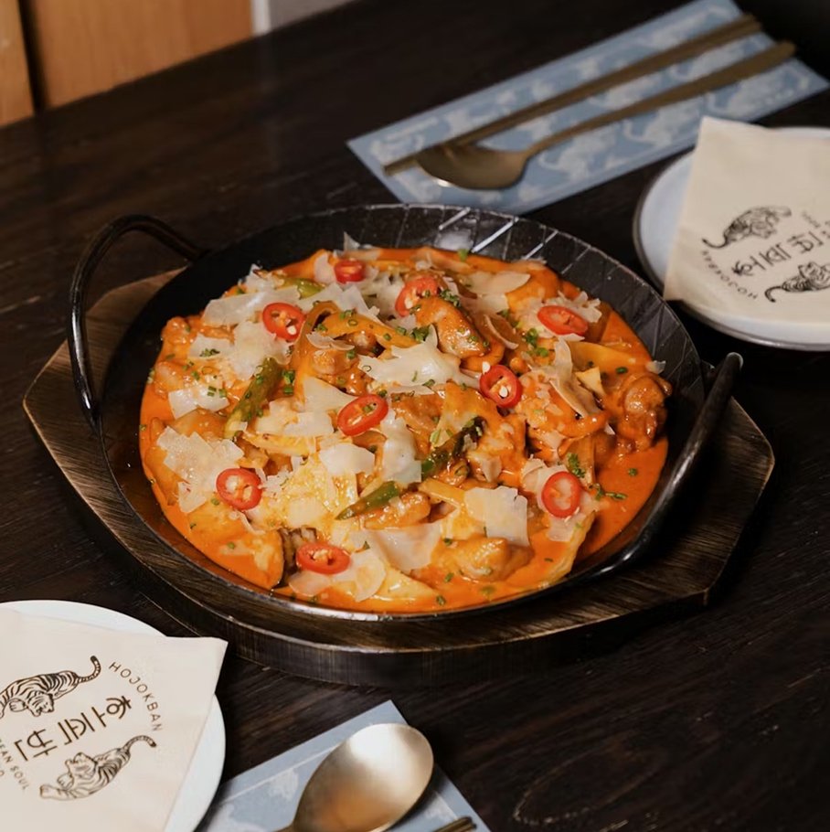 Rosé dak galbi — chicken and vegetables stir-fried in a creamy rosé gochujang sauce